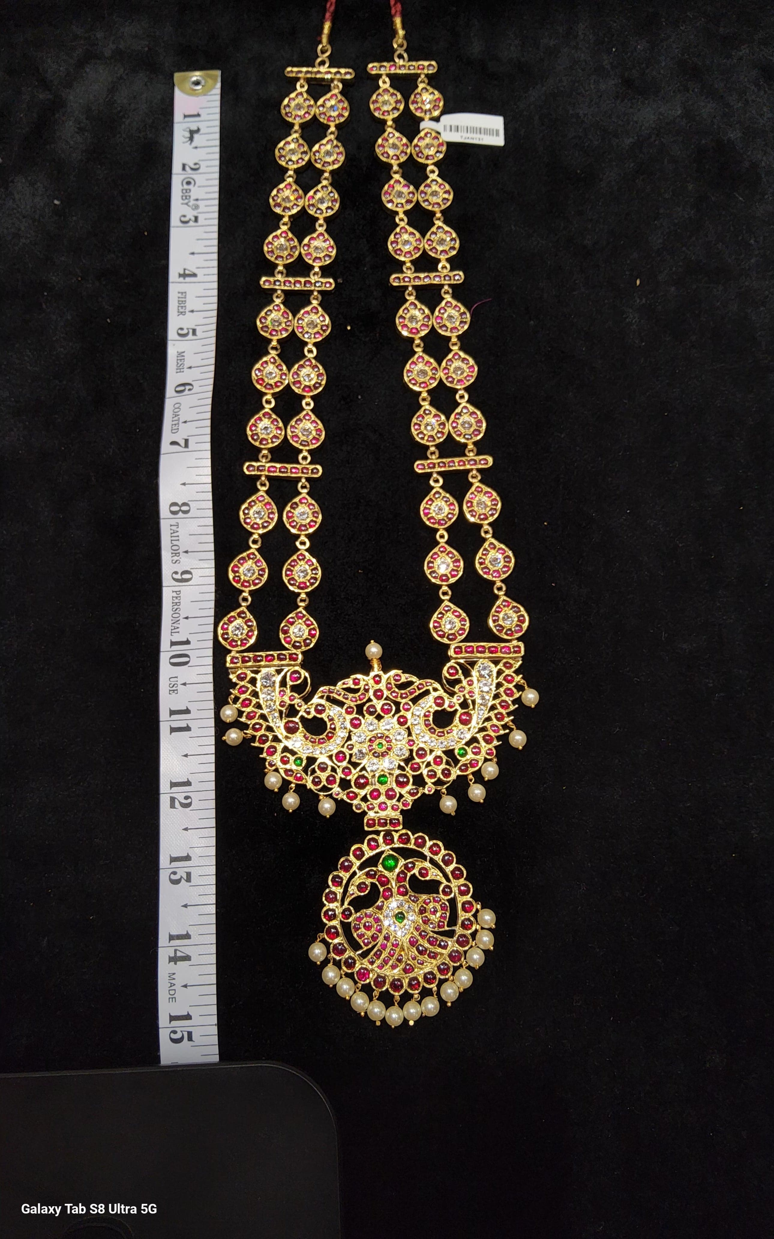 Kovi Mahari Malai. Close-up handmade pure silver temple jewellery with gold leaf.