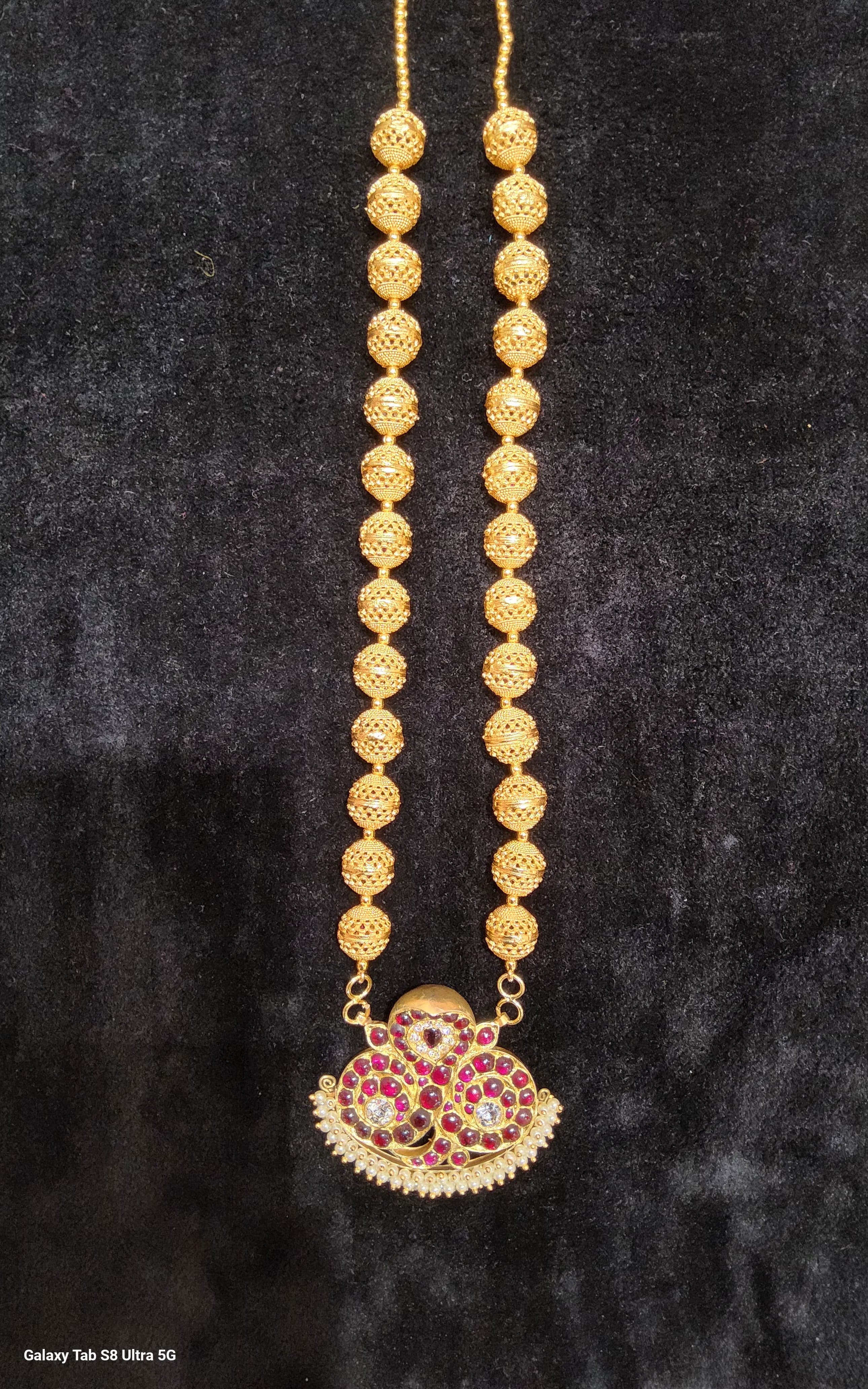 Exquisite Balls Malai temple jewelry, handcrafted with intricate gold ball designs, front view