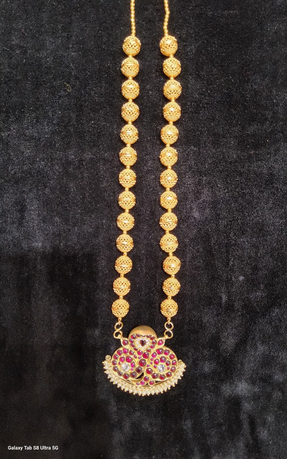 Exquisite Balls Malai temple jewelry, handcrafted with intricate gold ball designs, front view