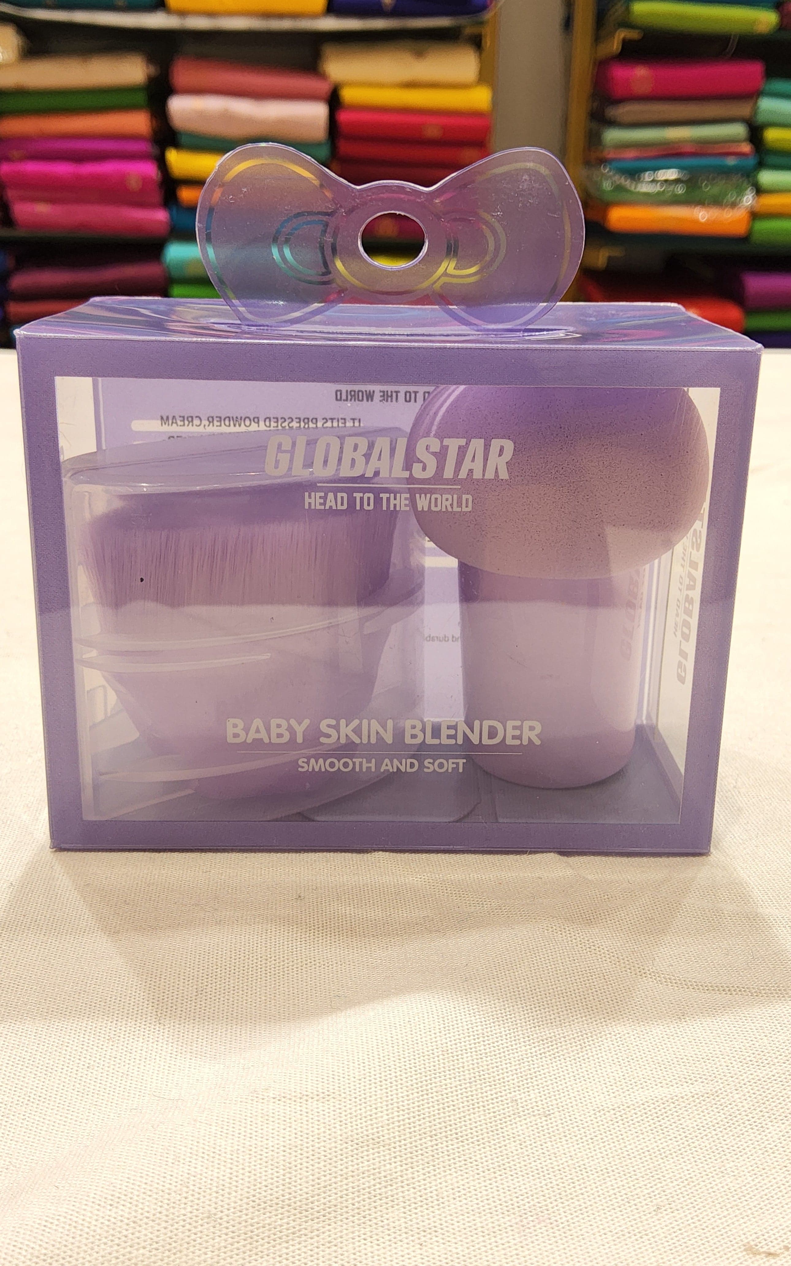 Close-up of a single purple makeup blender, showing soft texture for smooth makeup application.