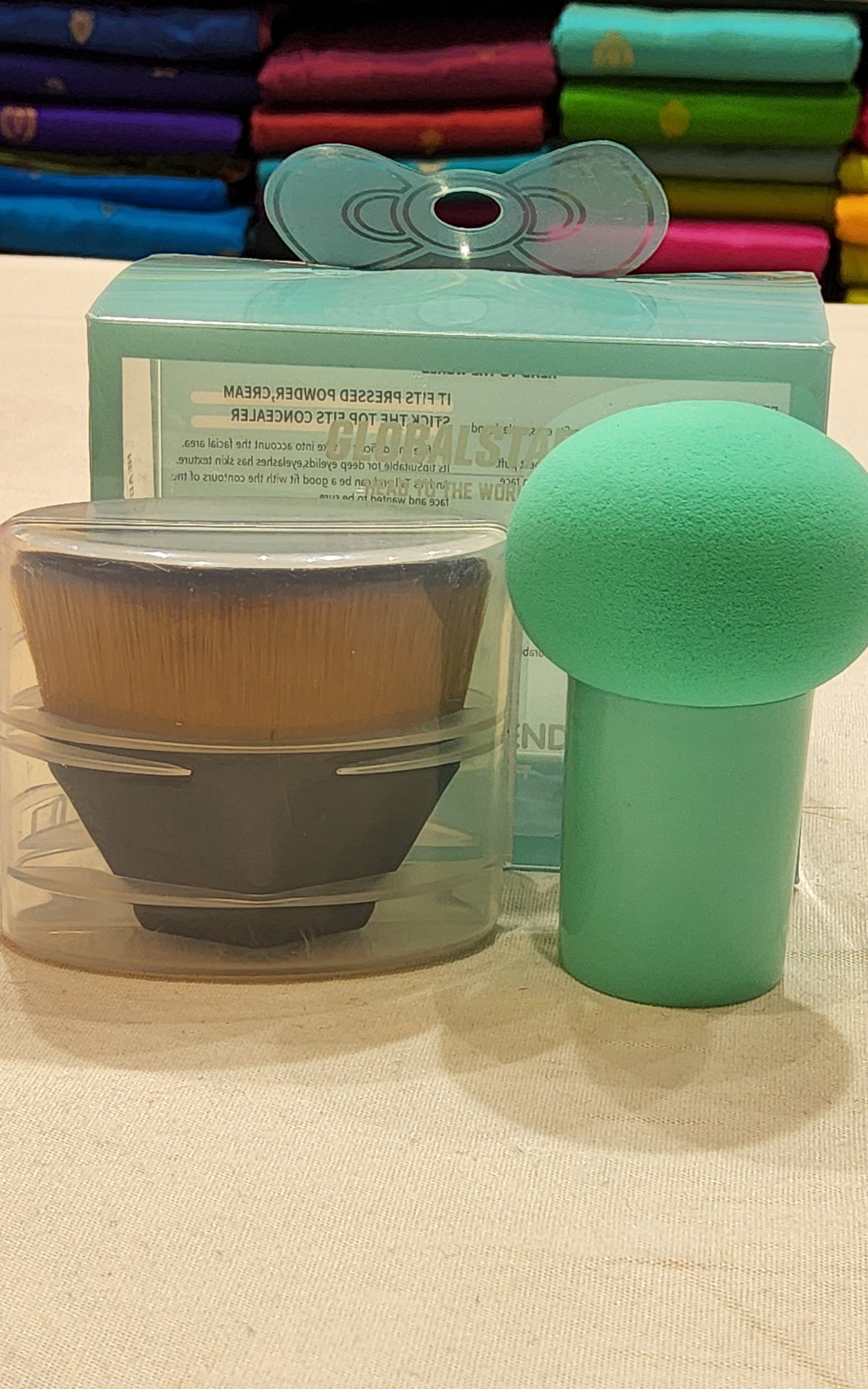 Pink makeup blender sponge on a white background, demonstrating its versatile shape for face contours.