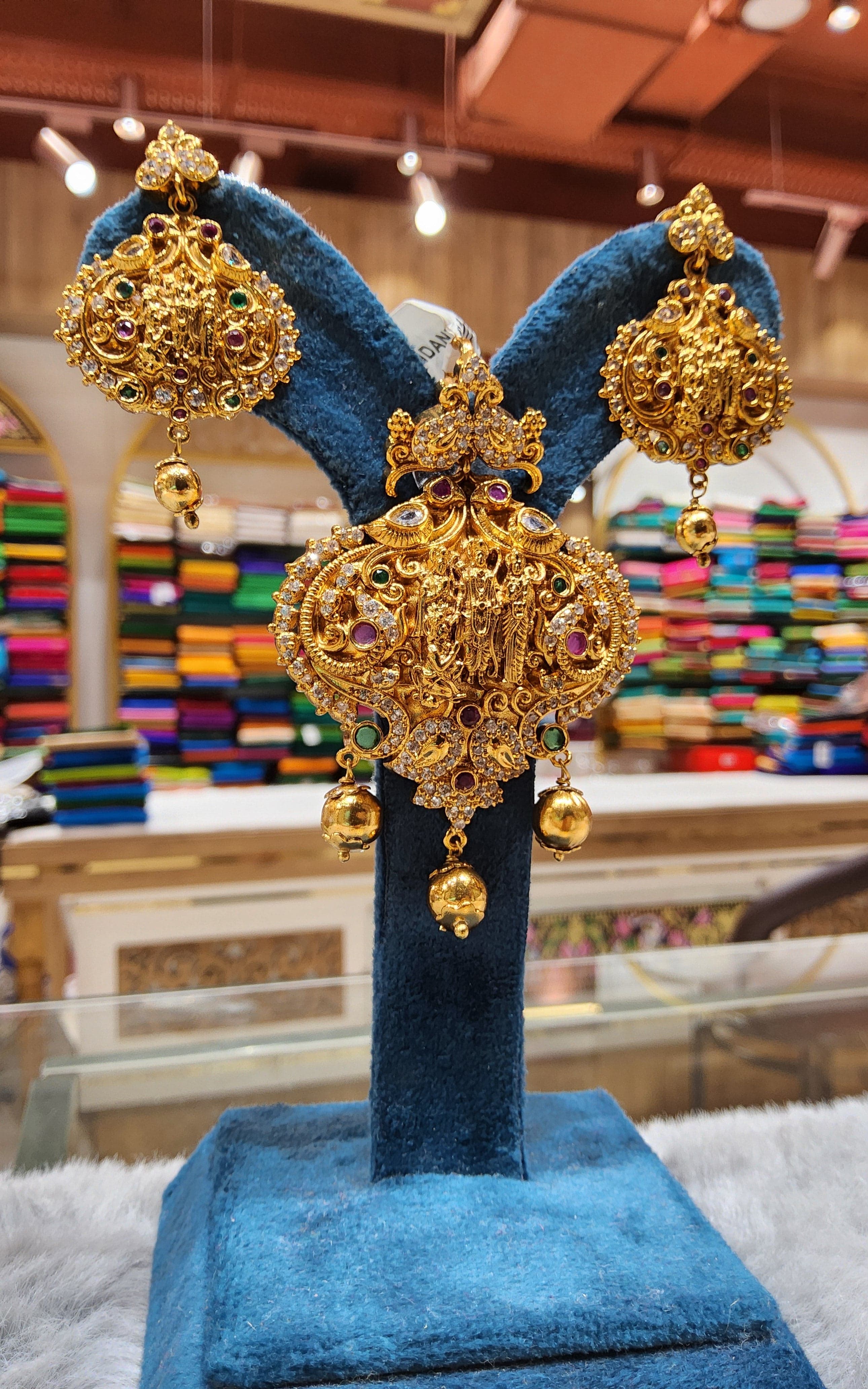 Close-up: Exquisite pendant dollar design, Indian jewelry for weddings, festivals