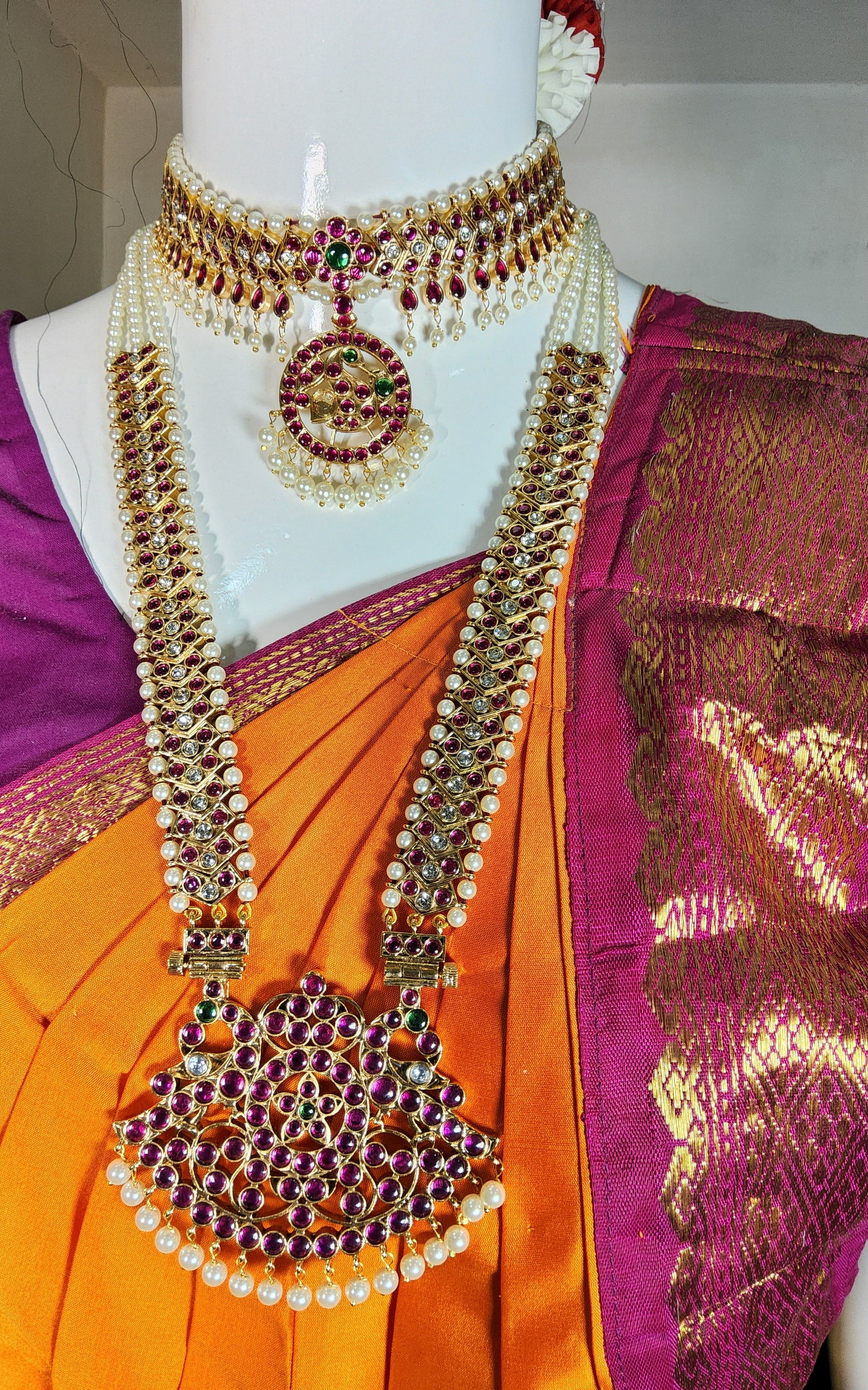 Close-up of Nirtyanjali copper temple jewellery necklace. Bharatnatyam jewellery detail.