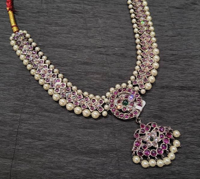 Close-up: Black Copper Short Necklace, pink & green glass stones, temple design.