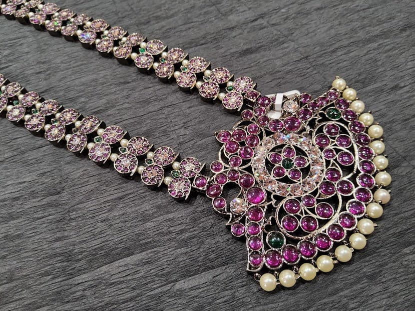 Margam Black Series Long Haram: Detailed copper temple design, black finish, dance jewellery.