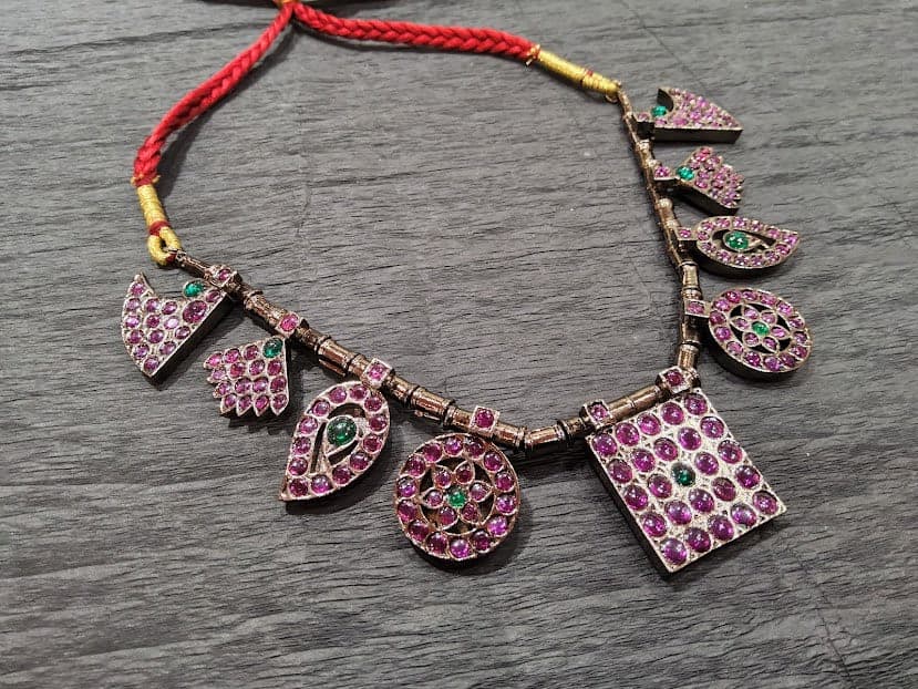 Black Copper Short Necklace: Rustic finish, pink & green stones, adjustable thread tie detail.