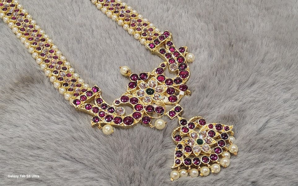 Close-up: Copper V Haram with Mahari details, Margam Collection, Indian dance jewelry