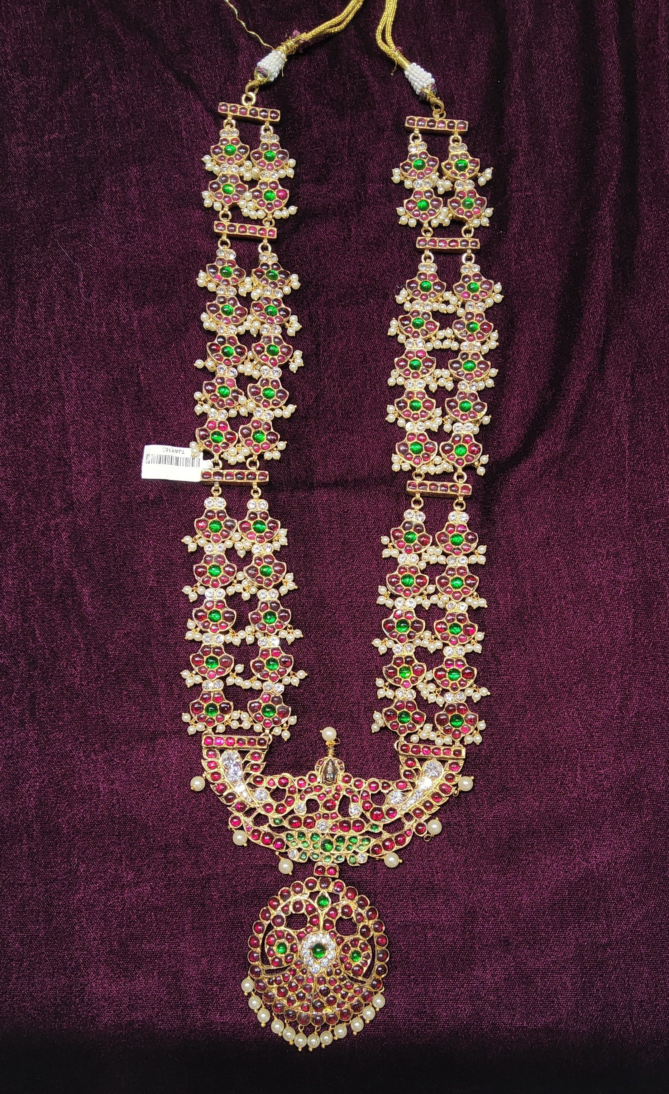 Close-up: Big Lakshmi Haram, original temple jewellery. Intricate Lakshmi Mahari Magudam design, long haram.