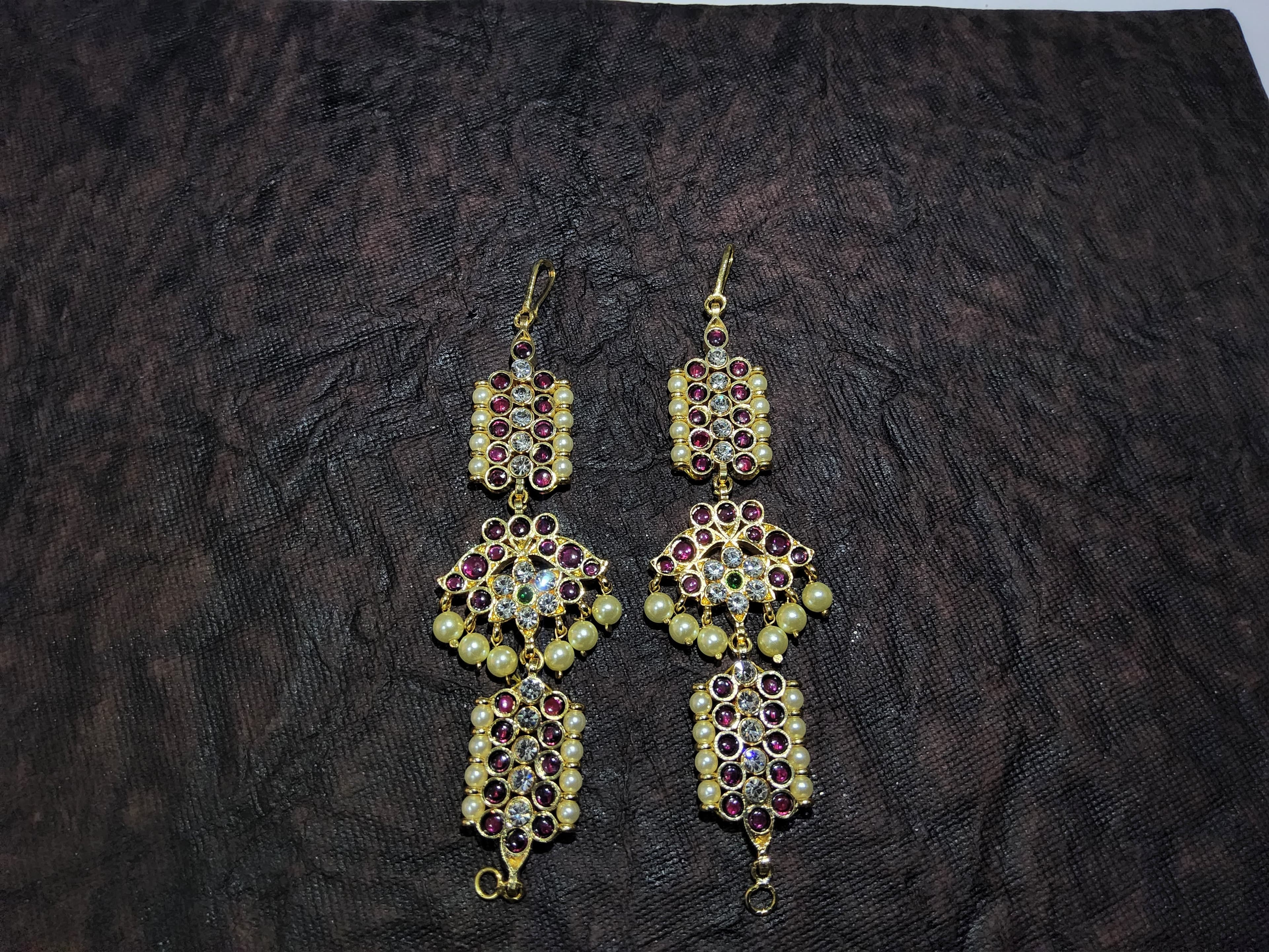 Flower Mattal: silver base gold leaf temple jewellery, traditional kemp stone design.