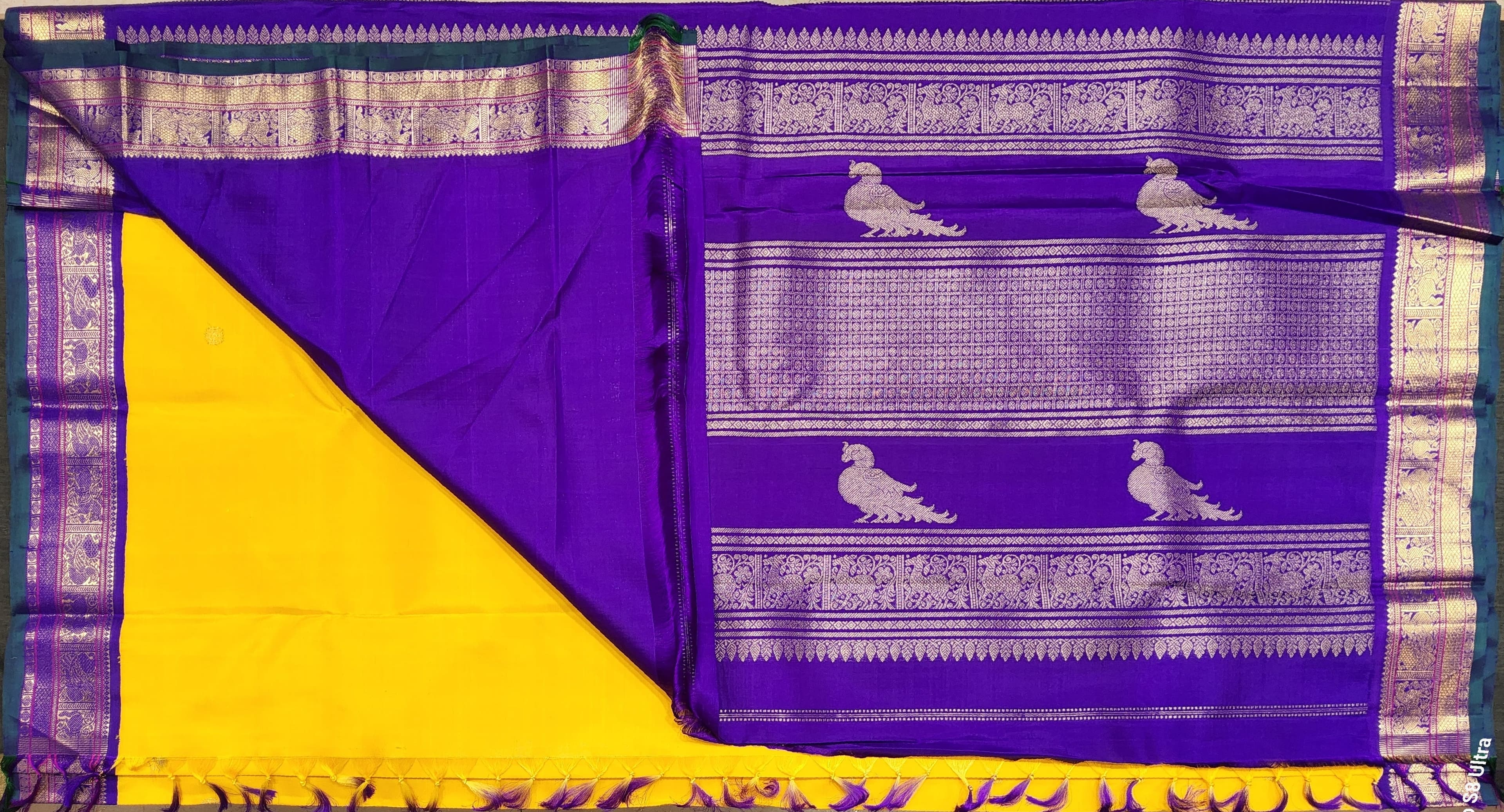 Kanchipuram Silk Saree: Yellow & Purple with 2G Gold Zari border detail.