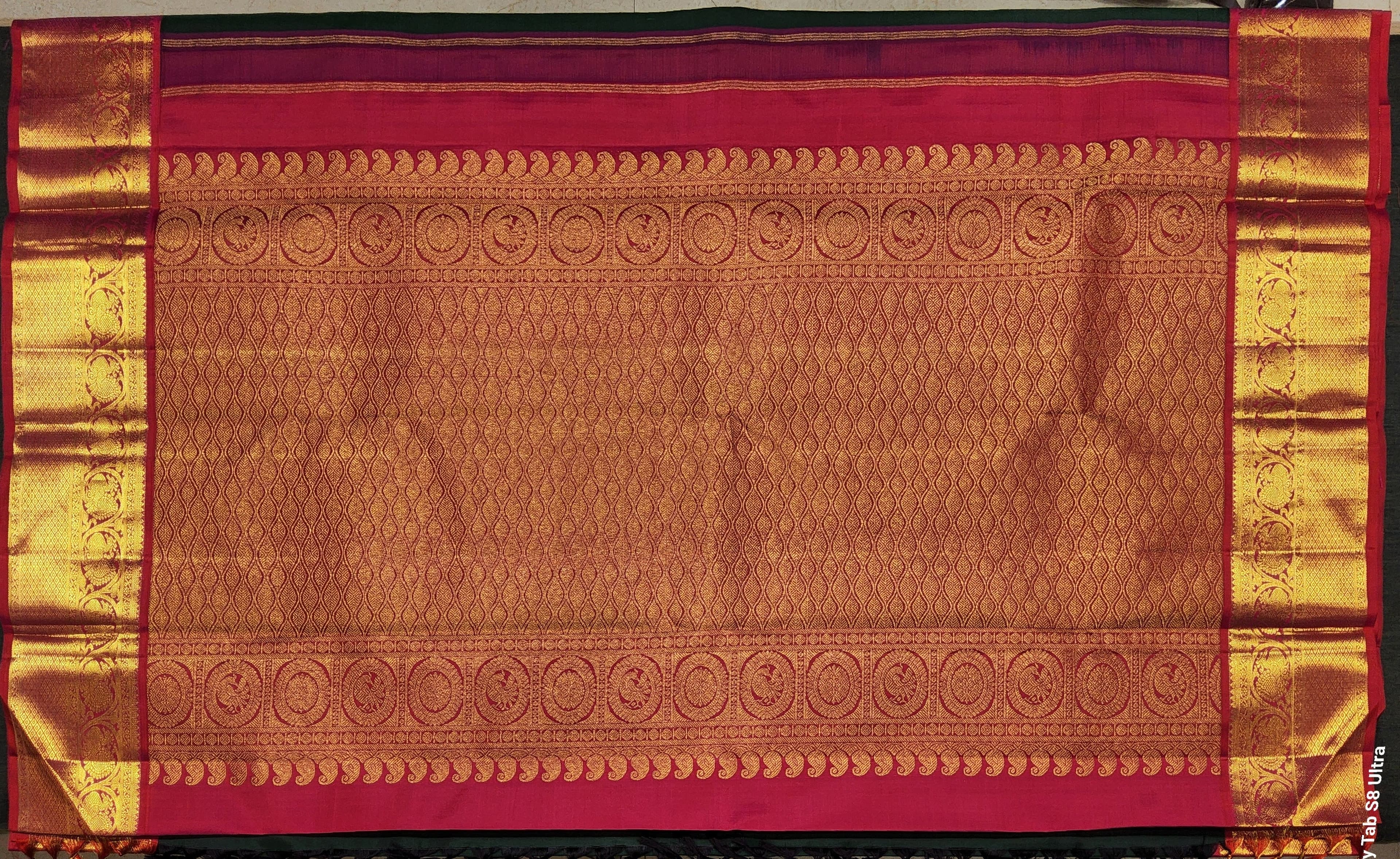 Elegant green silk saree with red border, handloom Kanchipuram