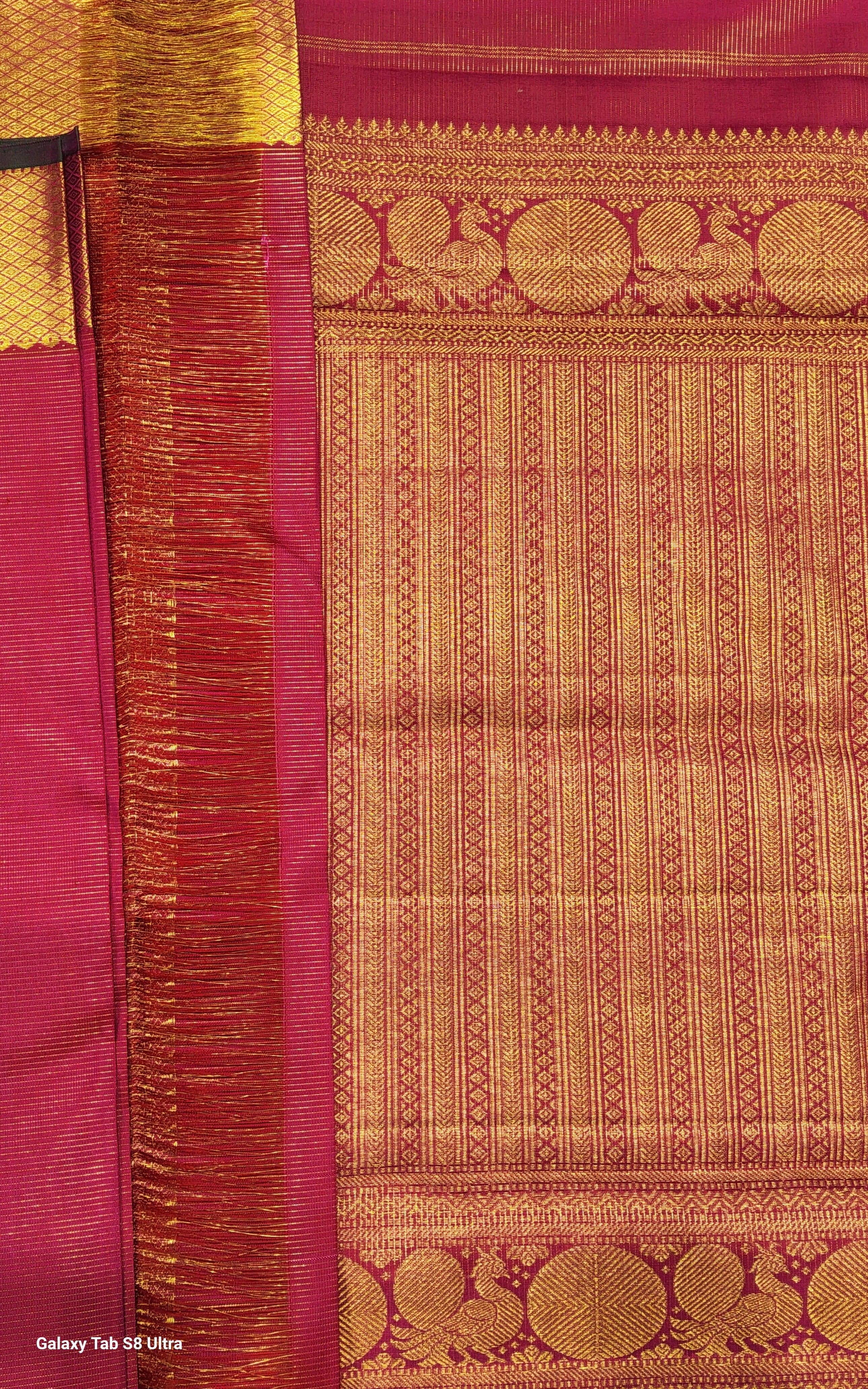 Pink Kanchipuram silk saree with gold zari border - exquisite Indian saree.