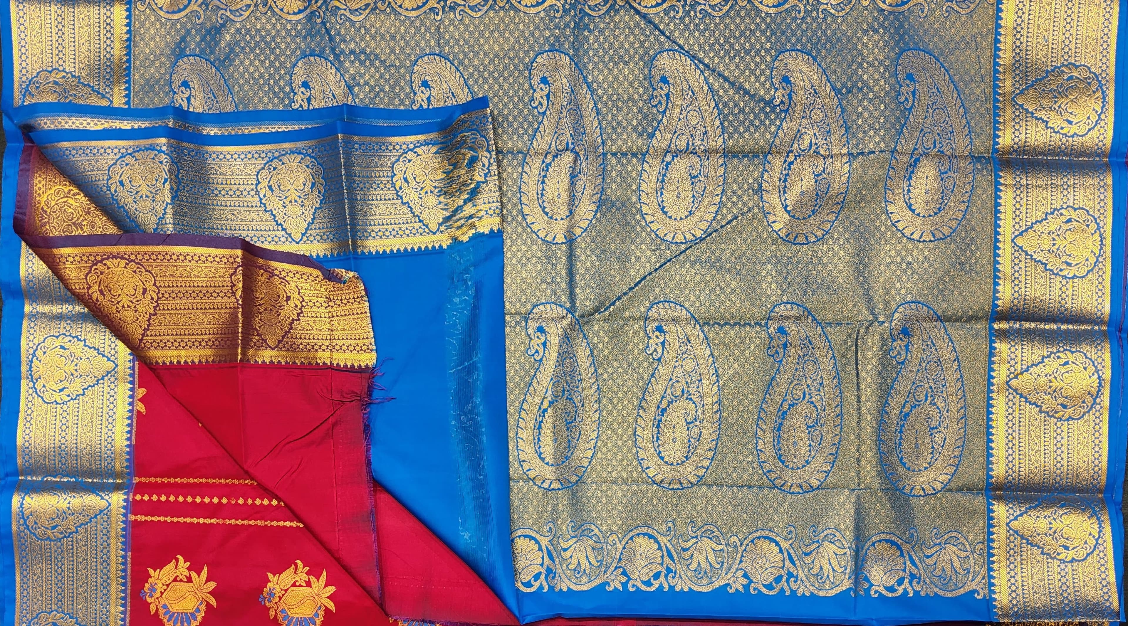 Silver base gold leaf temple haram with Lakshmi pendant, traditional design.