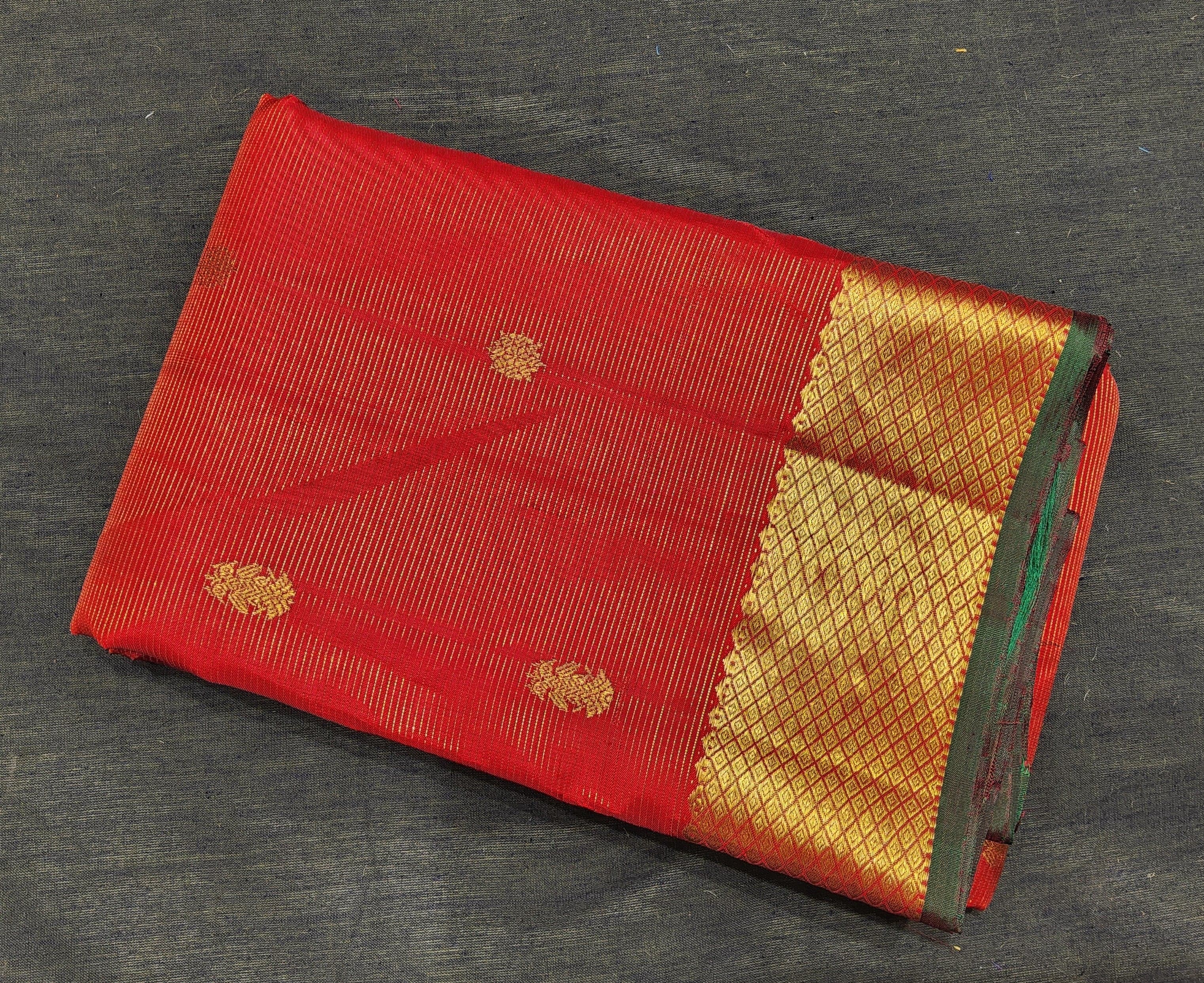 Red Kanchipuram authentic silk saree with gold zari, ideal arangetram costume.