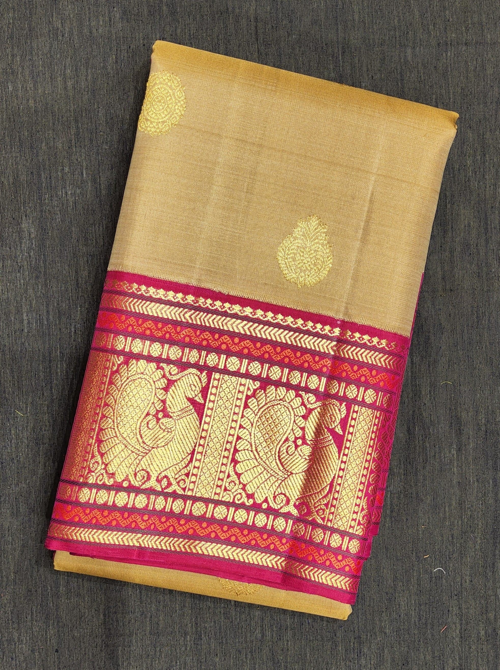 Mehandi Green Kanchipuram authentic silk saree for Arangetram; pink border with gold zari peacocks