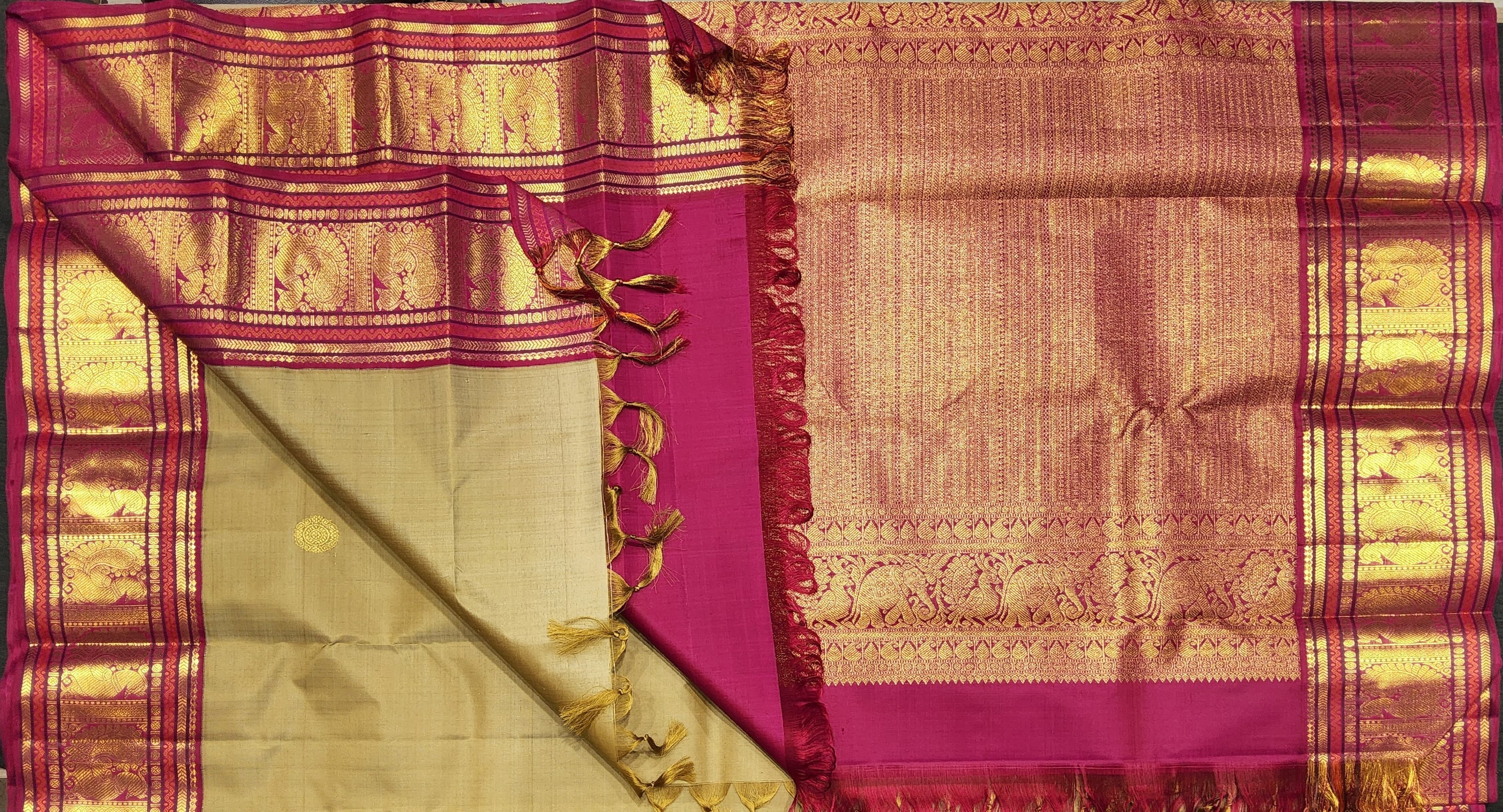 Kanchipuram authentic silk saree pallu detail: Mehandi Green with pink border, gold zari peacocks, ideal Arangetram