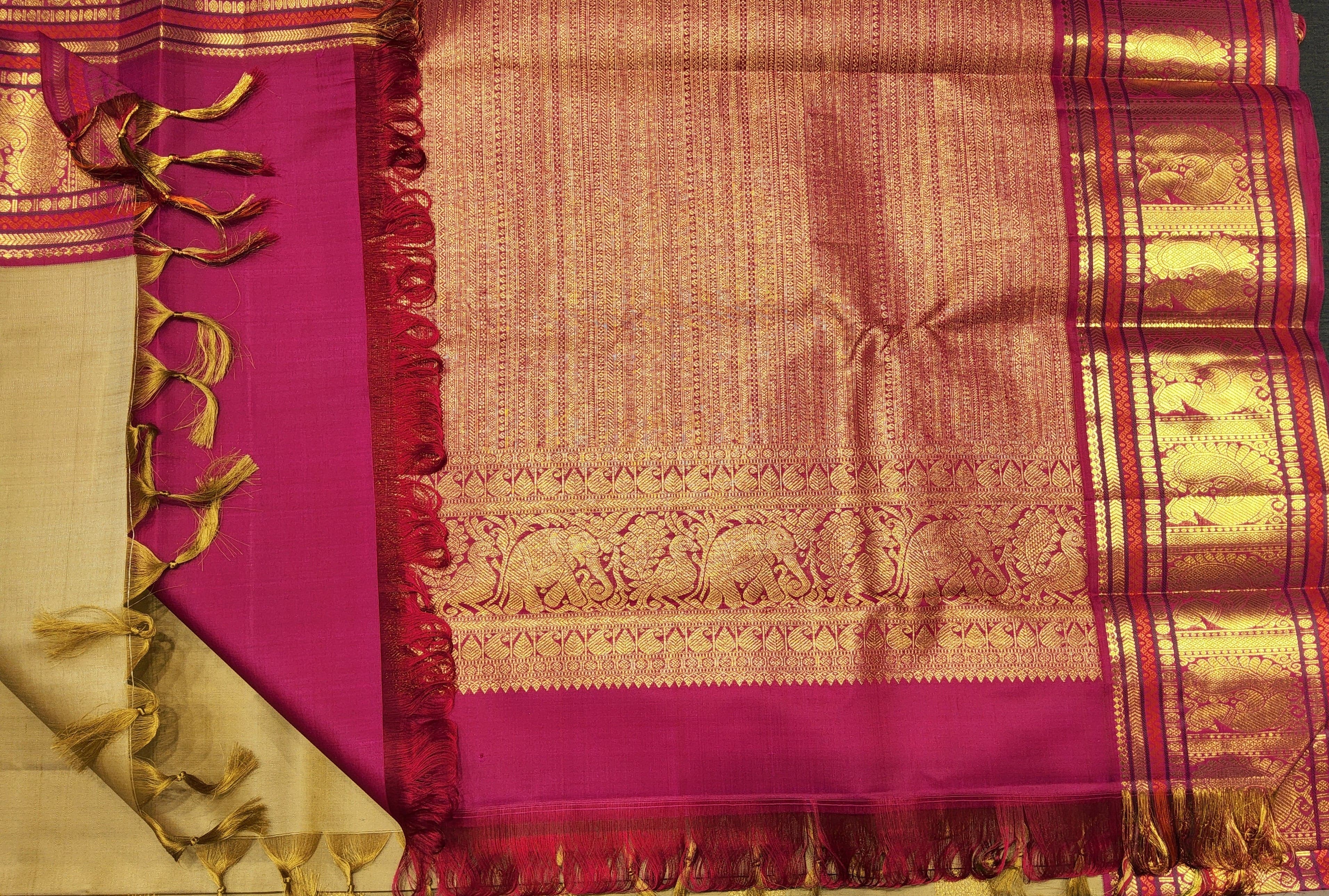 Close up of pink blouse piece and Kanchipuram saree border, authentic silk for Arangetram, geometric zari design