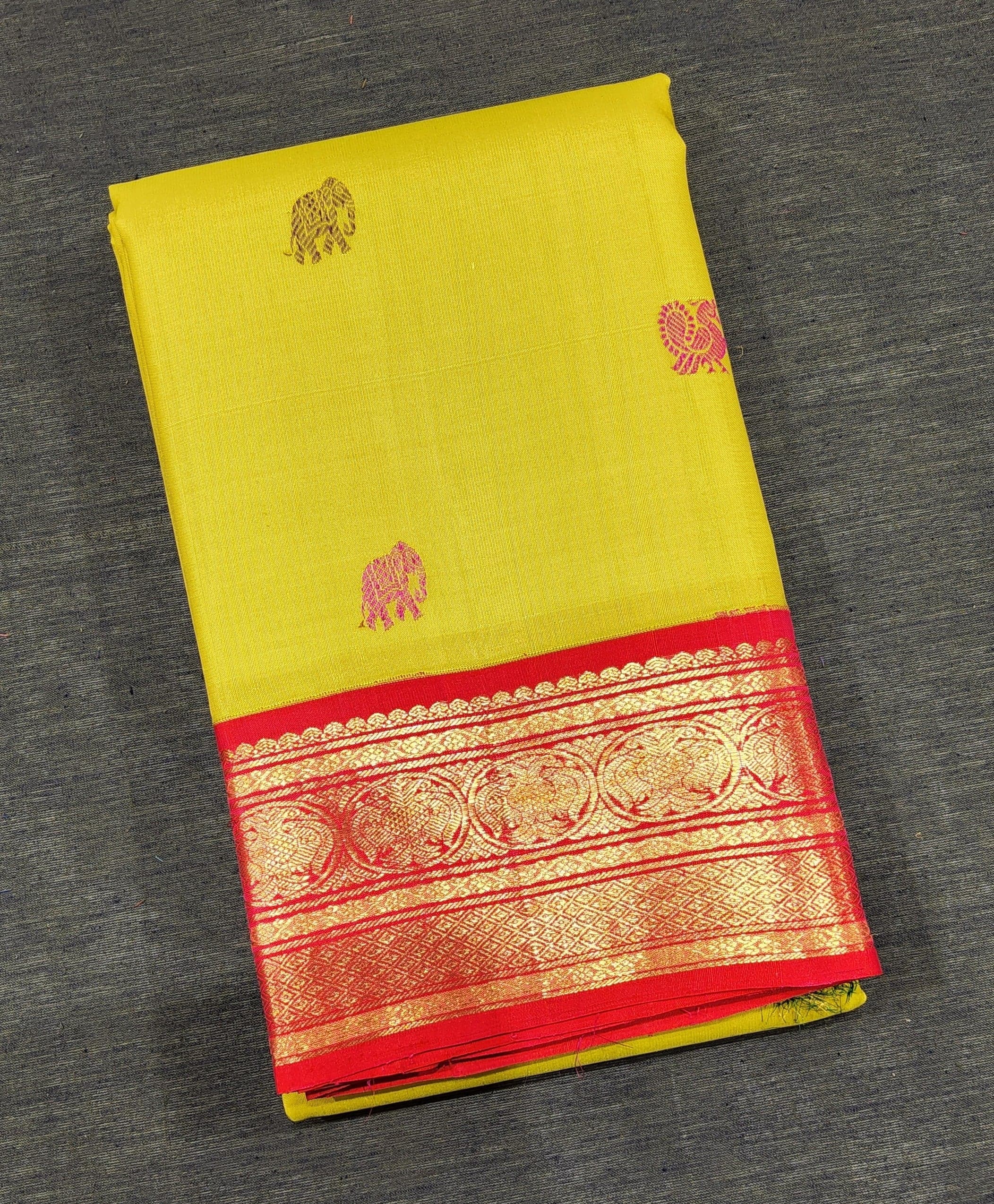 Yellow & Red Kanchipuram authentic silk saree for Arangetram, gold zari detail.