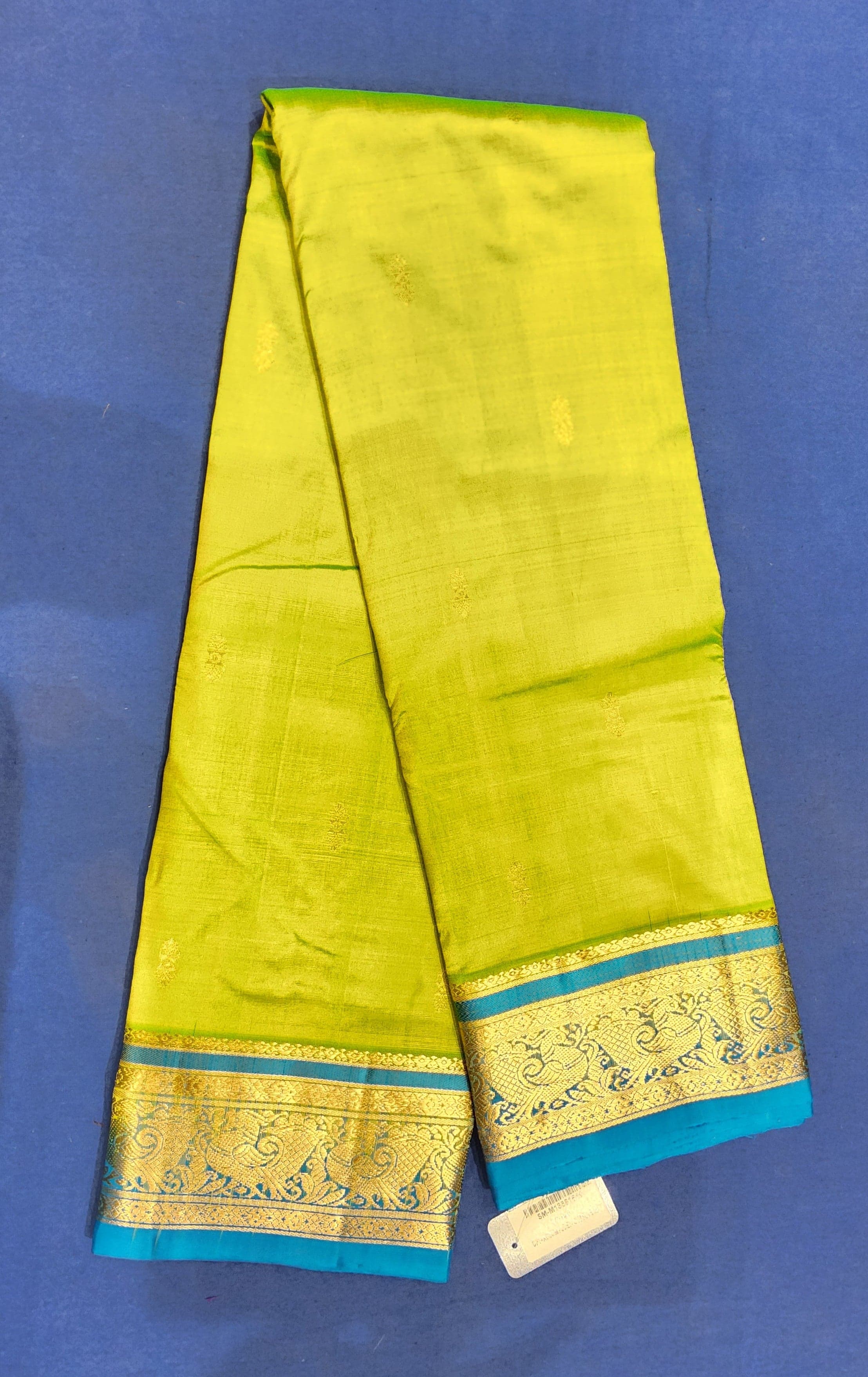 Close-up of zari border detail on Green Blue Dharmavaram pattu sarees, authentic silk