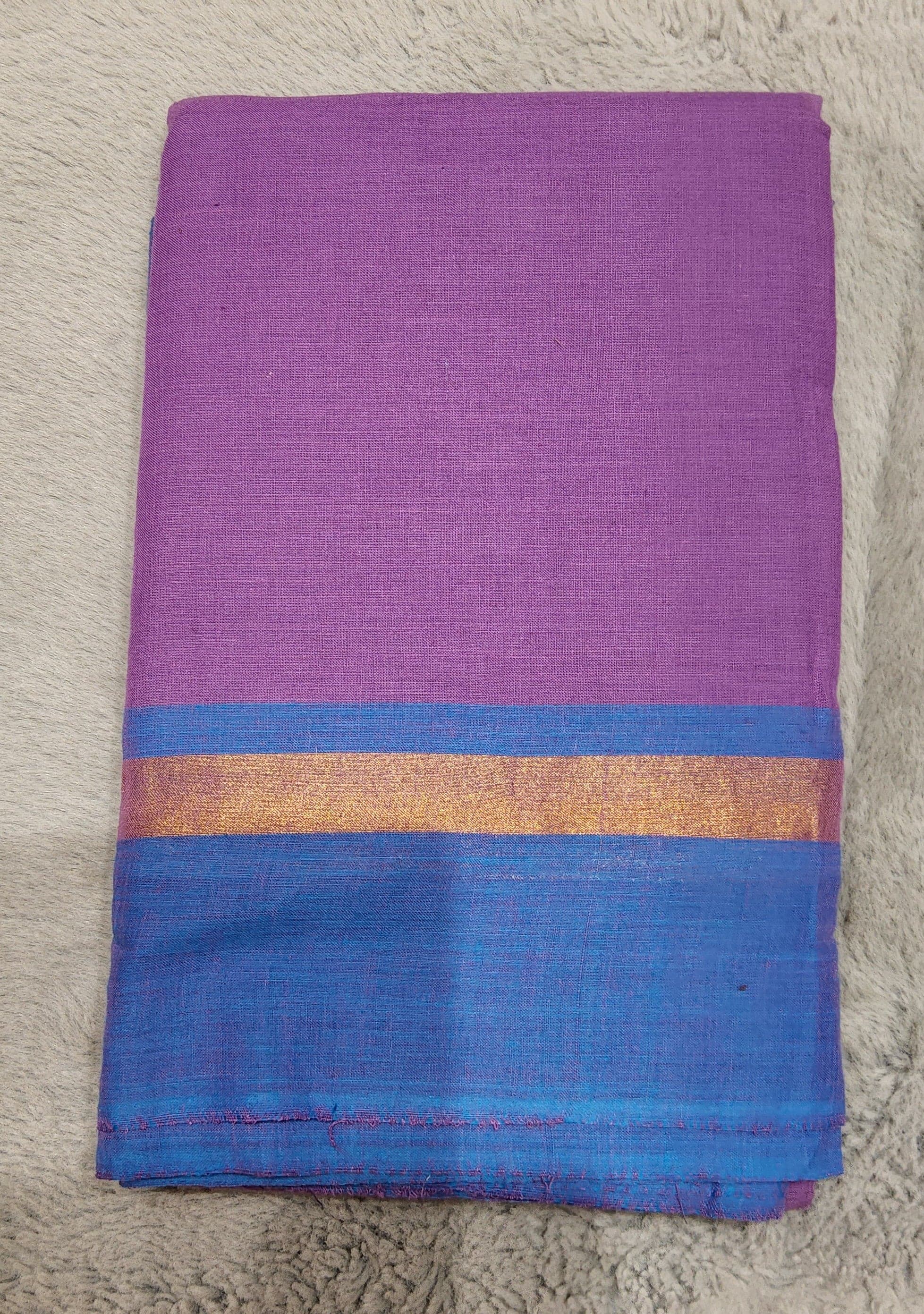 Dancer wearing cotton zari border practice saree, performing Aramandi pose.