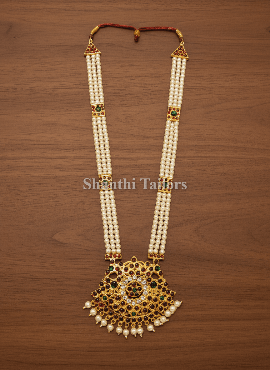 Close-up of Pearl Haram, silver base gold leaf temple pendant, ideal Bharatanatyam jewellery set detail.