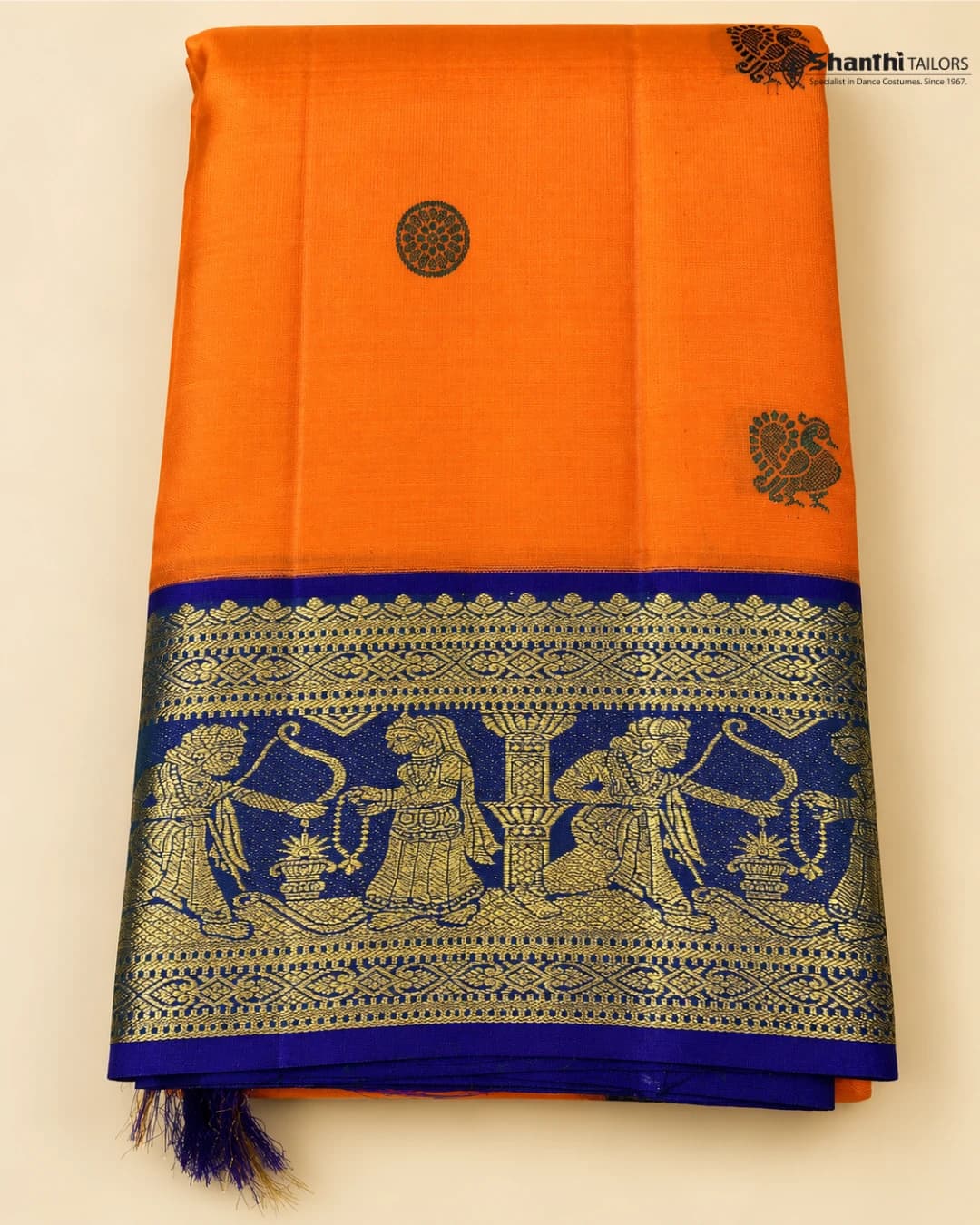 Pure Kanchipuram Silk Saree: vibrant orange with royal blue border & intricate gold traditional motifs.