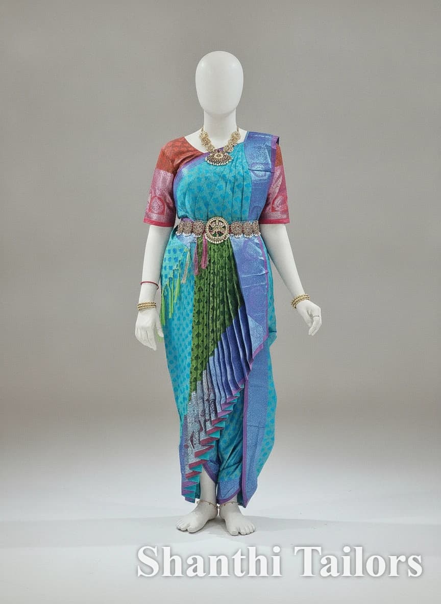 Readymade Sea Blue w Maroon Dhoti Cross fan w Free Flow dance costume on a mannequin with gold accessories.