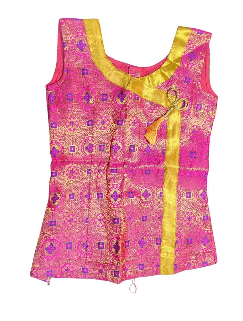 Close-up of 8-year-old's art silk Krishnar Top, showing gold medallion brocade detail, dance costume.