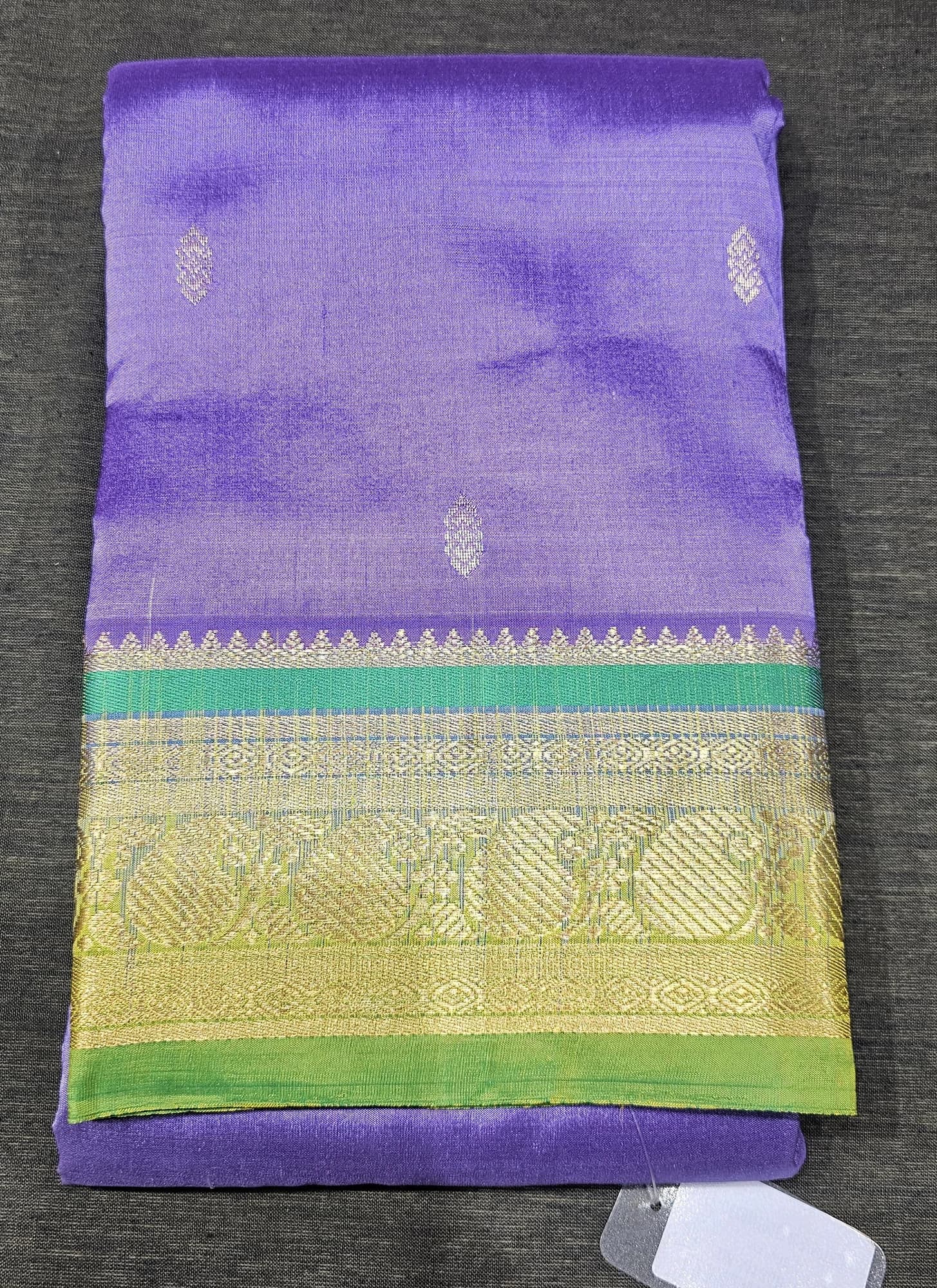 Purple w Green Dharmavaram Silk Saree with gold zari border and silver motifs.