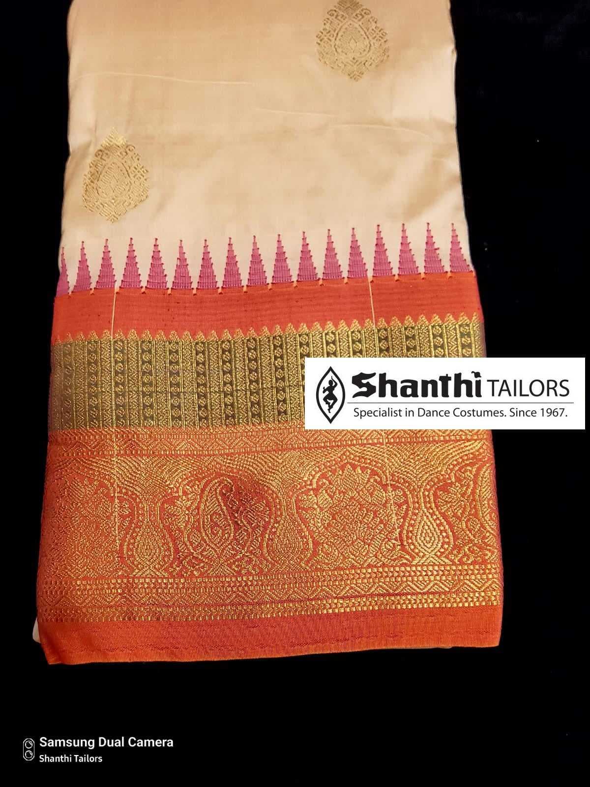 Artificial Kanchipuram silk saree for dance: Close-up of golden-yellow temple border, practice saree.