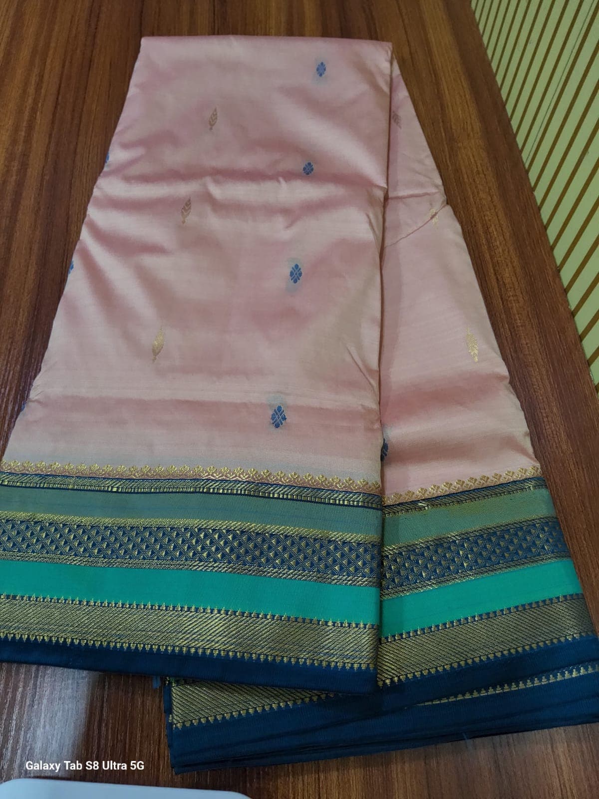 Baby pink Madi Saree with blue border. Traditional Indian saree.