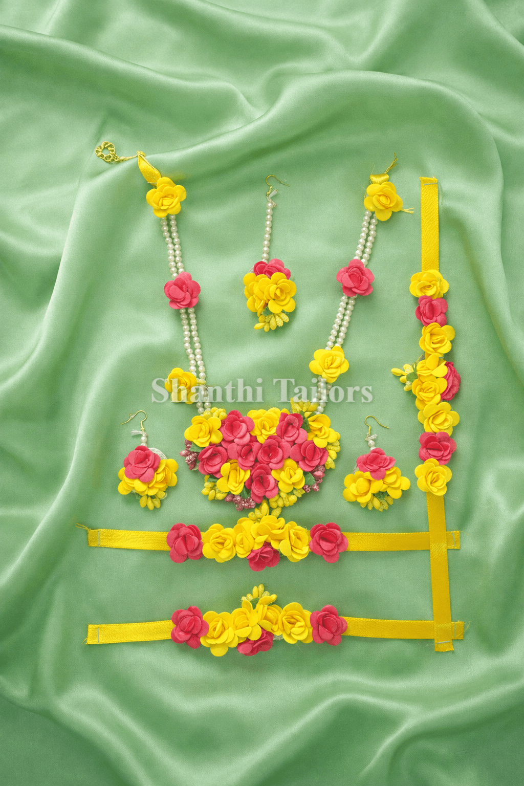 Radha costume: Full view of the pink and yellow fabric flower bharatanatyam jewellery set