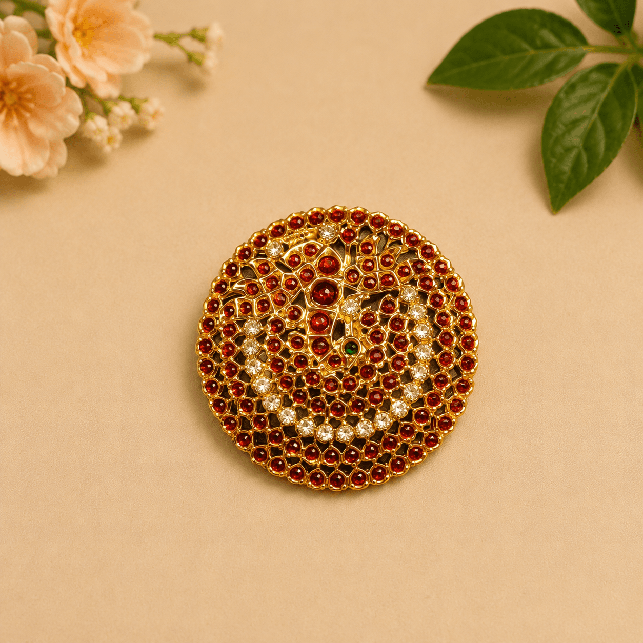 Bharatanatyam kit: gold foil temple jewelry necklace and jhumkas detail.