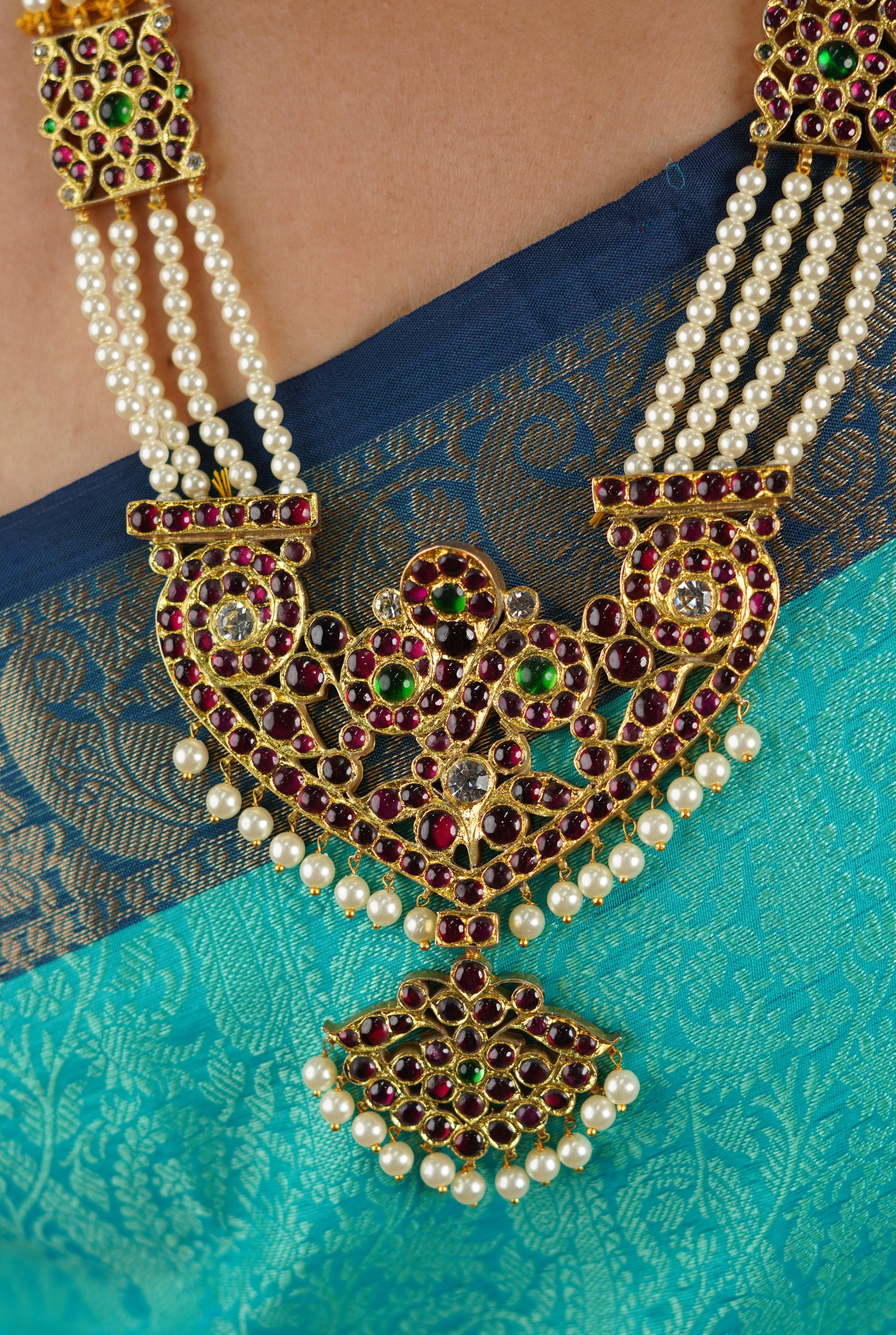 Close-up: Pearl Haram Temple Jewellery showing detailed craftsmanship and pearl accents.