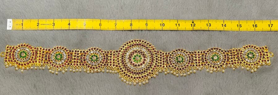 Stone Belt Imitation Jewellery: Close-up of adjustable thread tie on dance waist belt