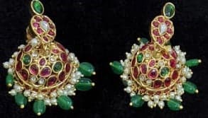 Full view of the Antique Mango Malai Set's long copper chain, adorned with colorful white, green, and red stones.