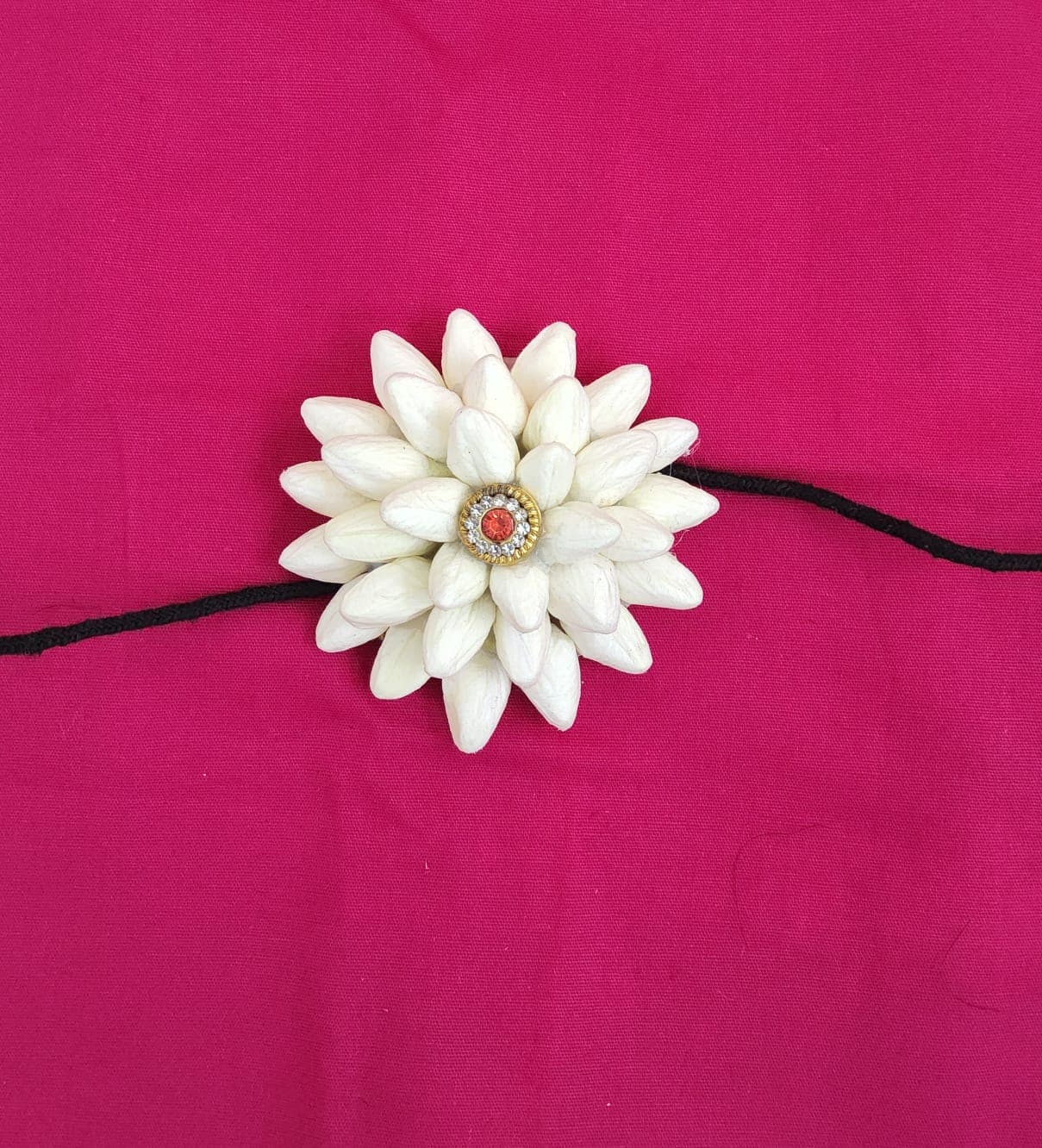 Orange Flower Rockodi: Single flower for classical dance hair. Traditional Indian accessory.
