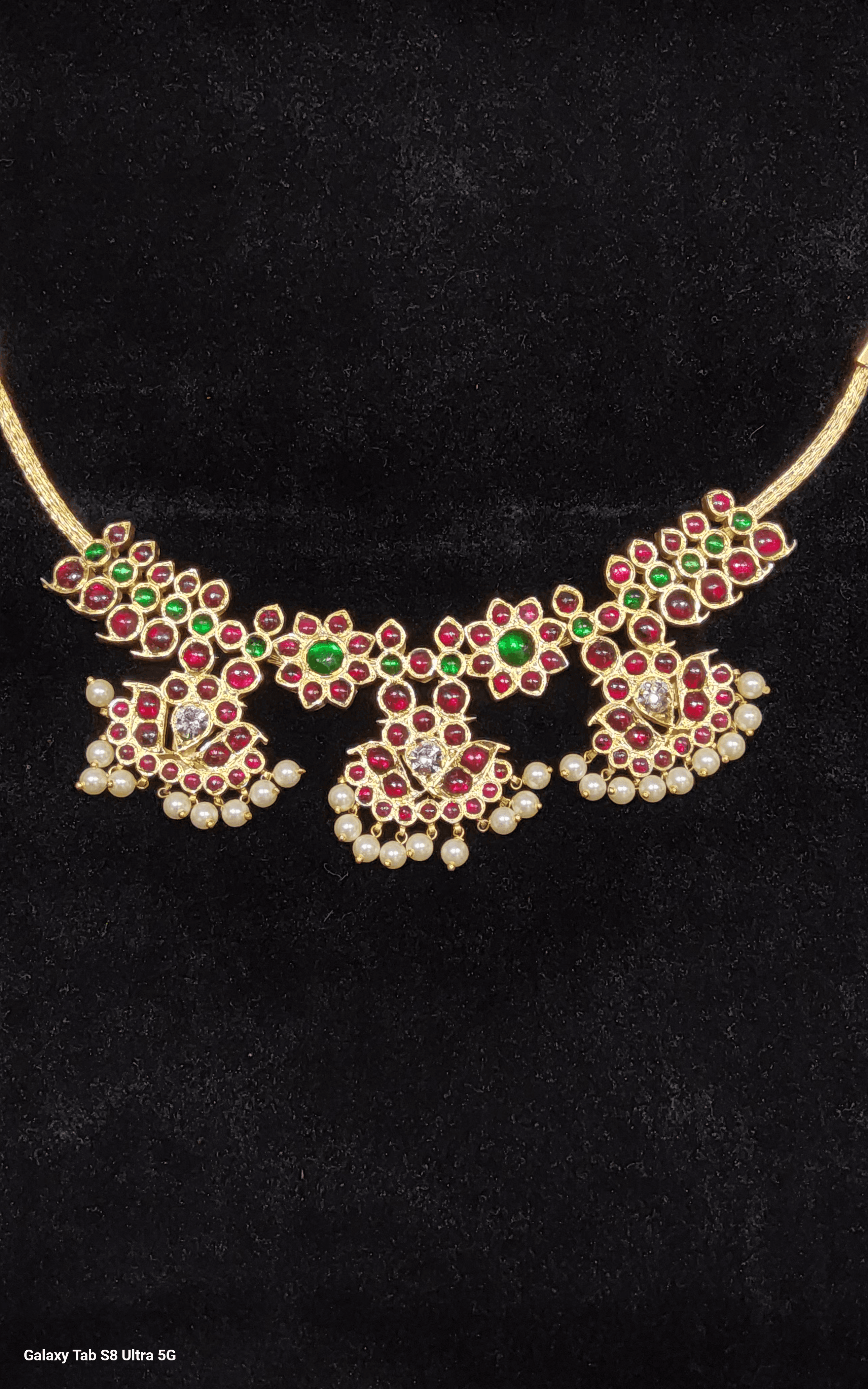 Close up of silver base gold leaf 3 Pcs Mango temple jewellery necklace, kemp stone details