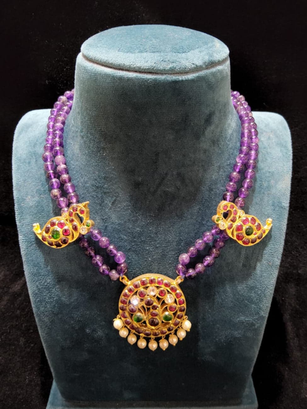 Temple jewellery beaded necklace: silver base gold leaf beads and detailing.
