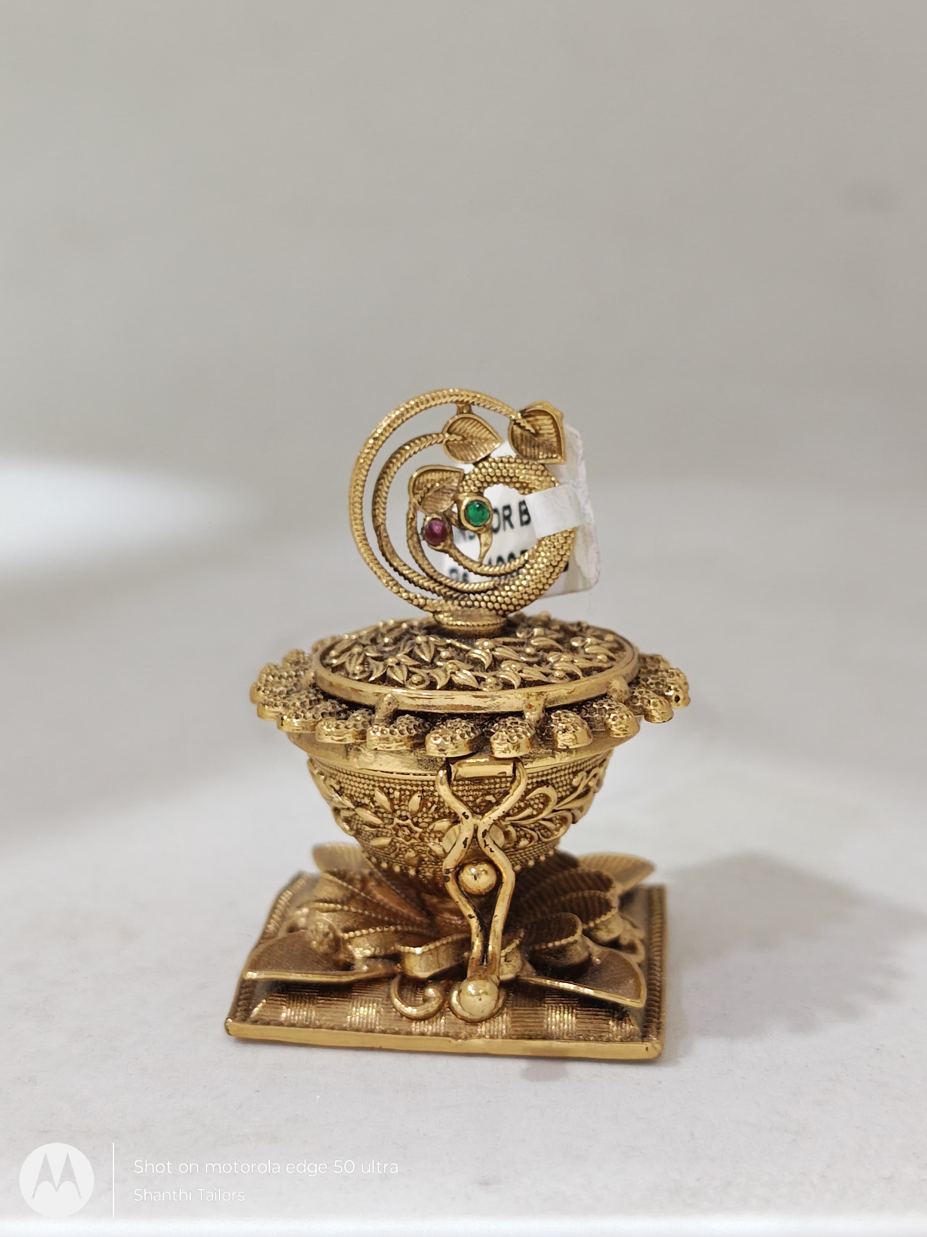Open Sindoor Box revealing interior. Decorative ethnic container for pooja and weddings.