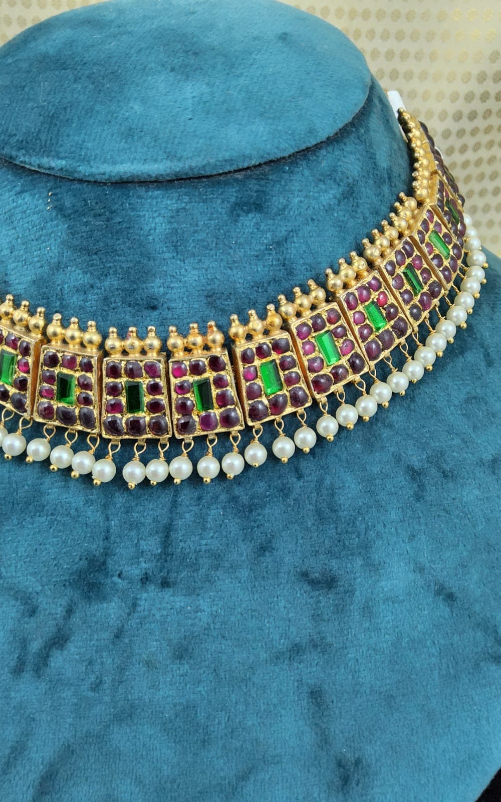 Poothali Necklace, gold plated temple jewellery, with matching earrings, close-up.