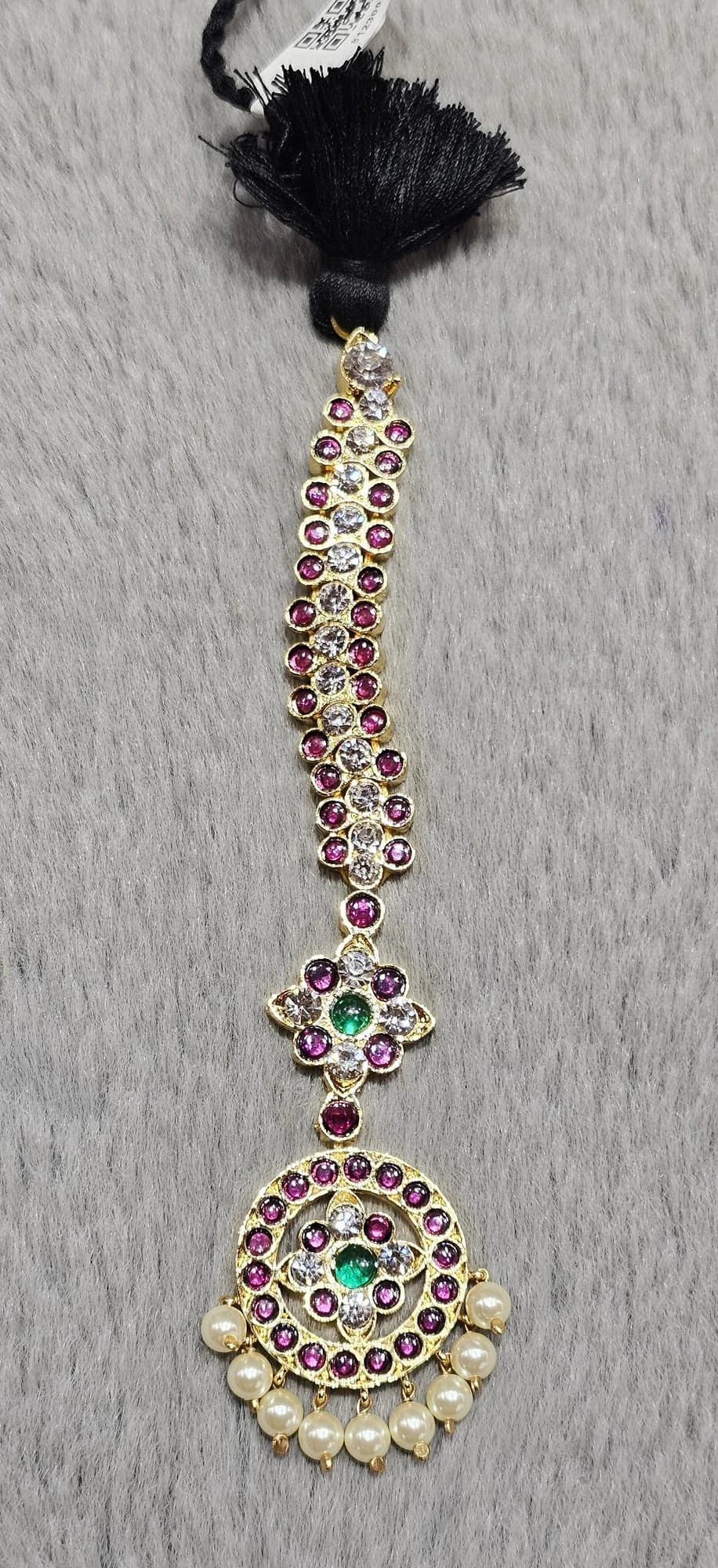 Round Chutty / Tikka (812300) copper jewellery, adorned with ruby, clear, and emerald stones, plus pearl drops.