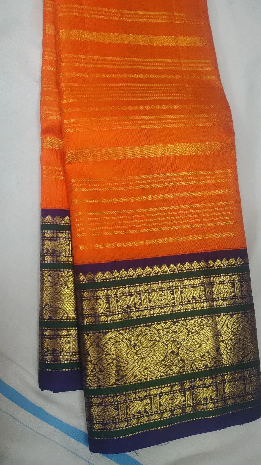 Orange Kanchipuram Silk Saree with Brown Border