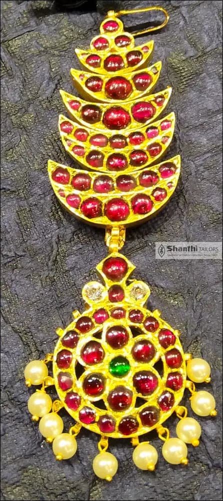 Close-up: TJSS115 Half Moon Chutty Tikka. Temple jewelry for Kuchipudi. Gold leaf detailing, traditional design.