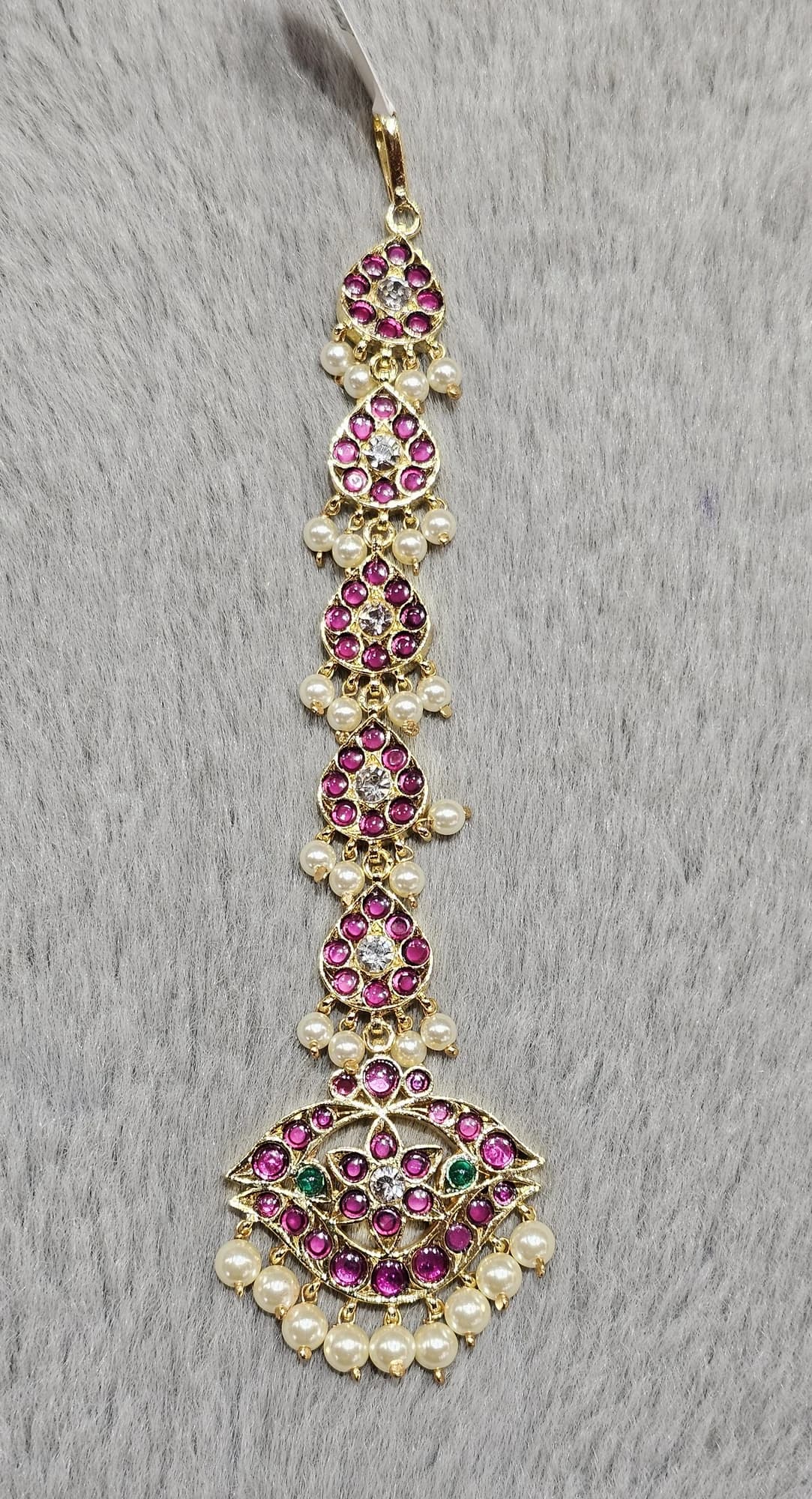 Elegant Leaf Drops Chutty/Tikka (81055) in gold-toned copper with pink stones, white zircons, & pearls.