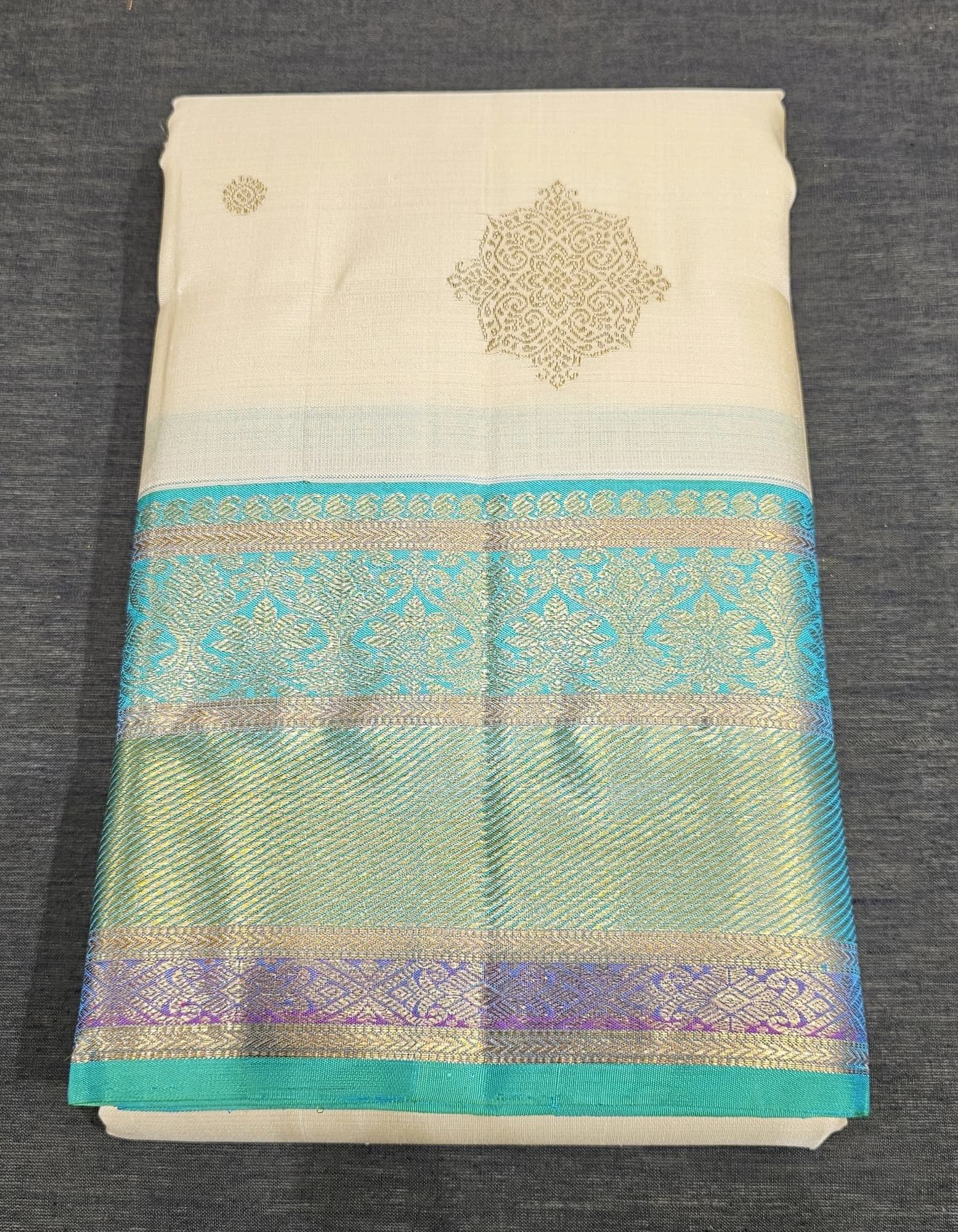 Folded Off White w Green Kanchipuram Silk Saree, SESS94, intricate gold motifs & zari borders.