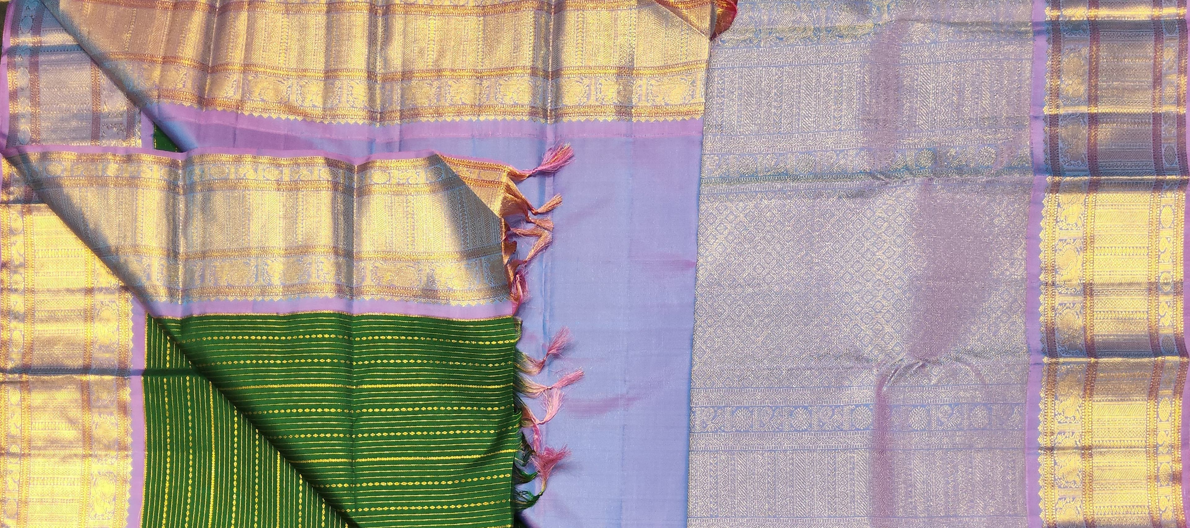 Emerald green blouse piece with zari detail for Kanchipuram authentic silk saree. Dance practice saree.