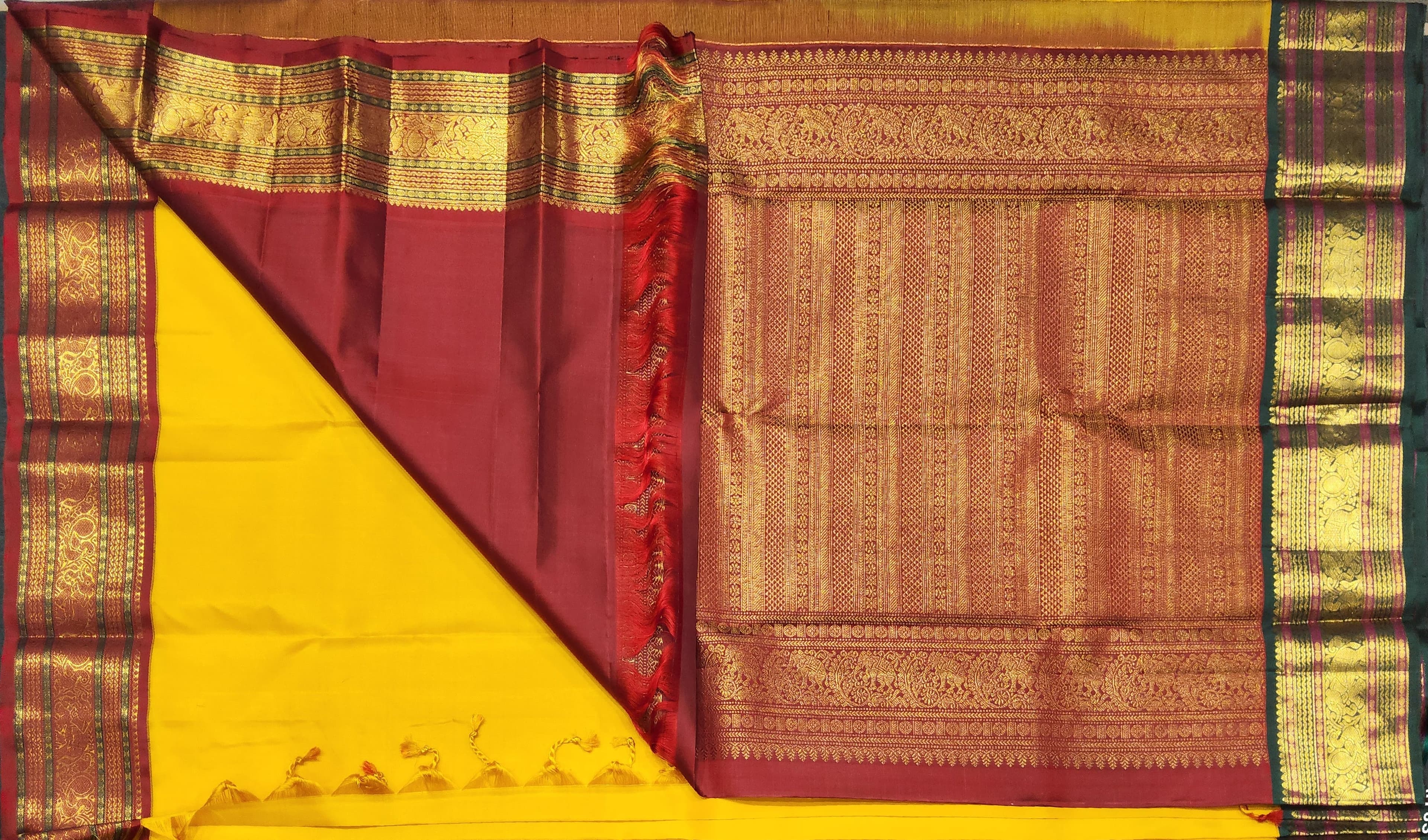 Mustard Kanchipuram silk saree pallu detail. Authentic silk Dharmavaram sarees pallu design.