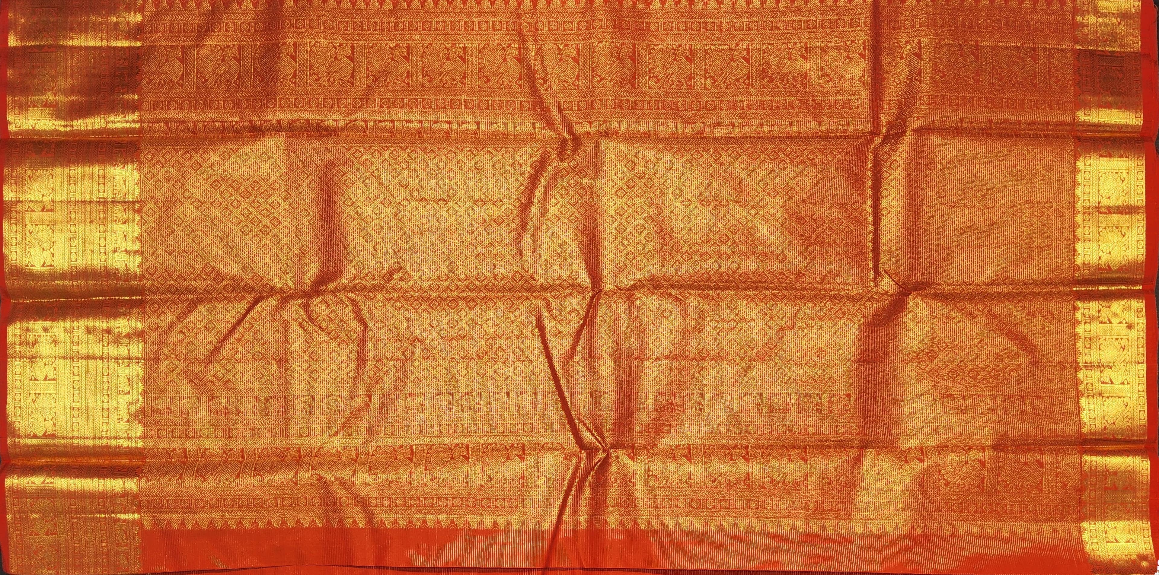 Orange Kanchipuram authentic silk, Arangetram saree pallu detail with gold zari.