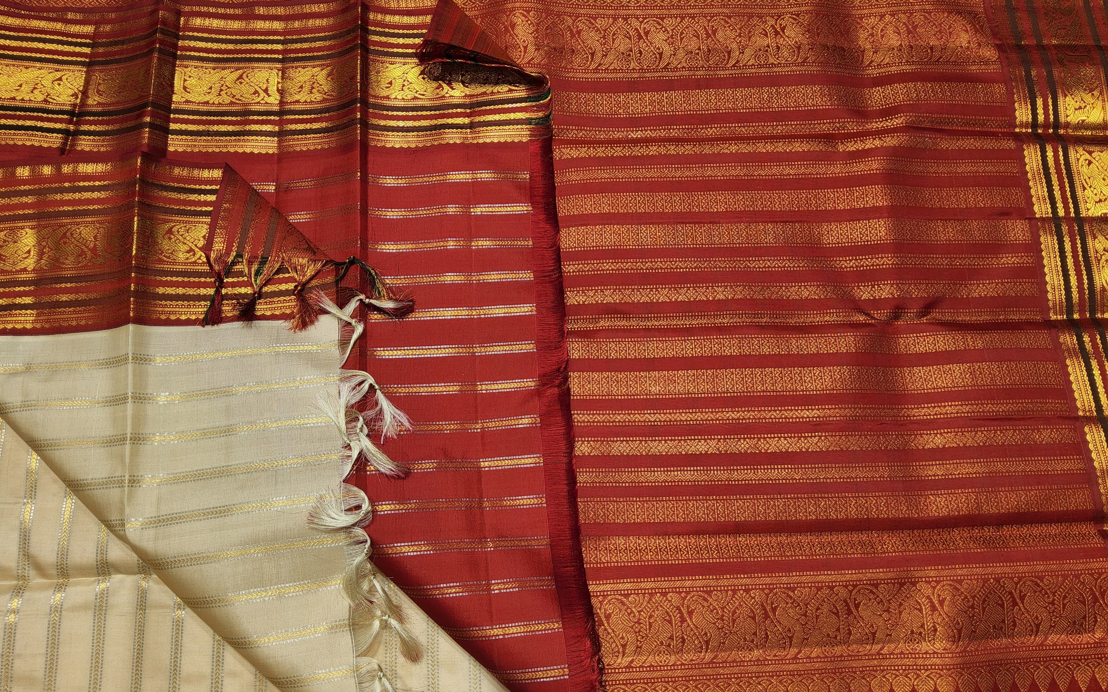 Dharmavaram pattu sarees alternative: Kanchipuram authentic silk off-white and maroon saree for Arangetram; pleating shown.